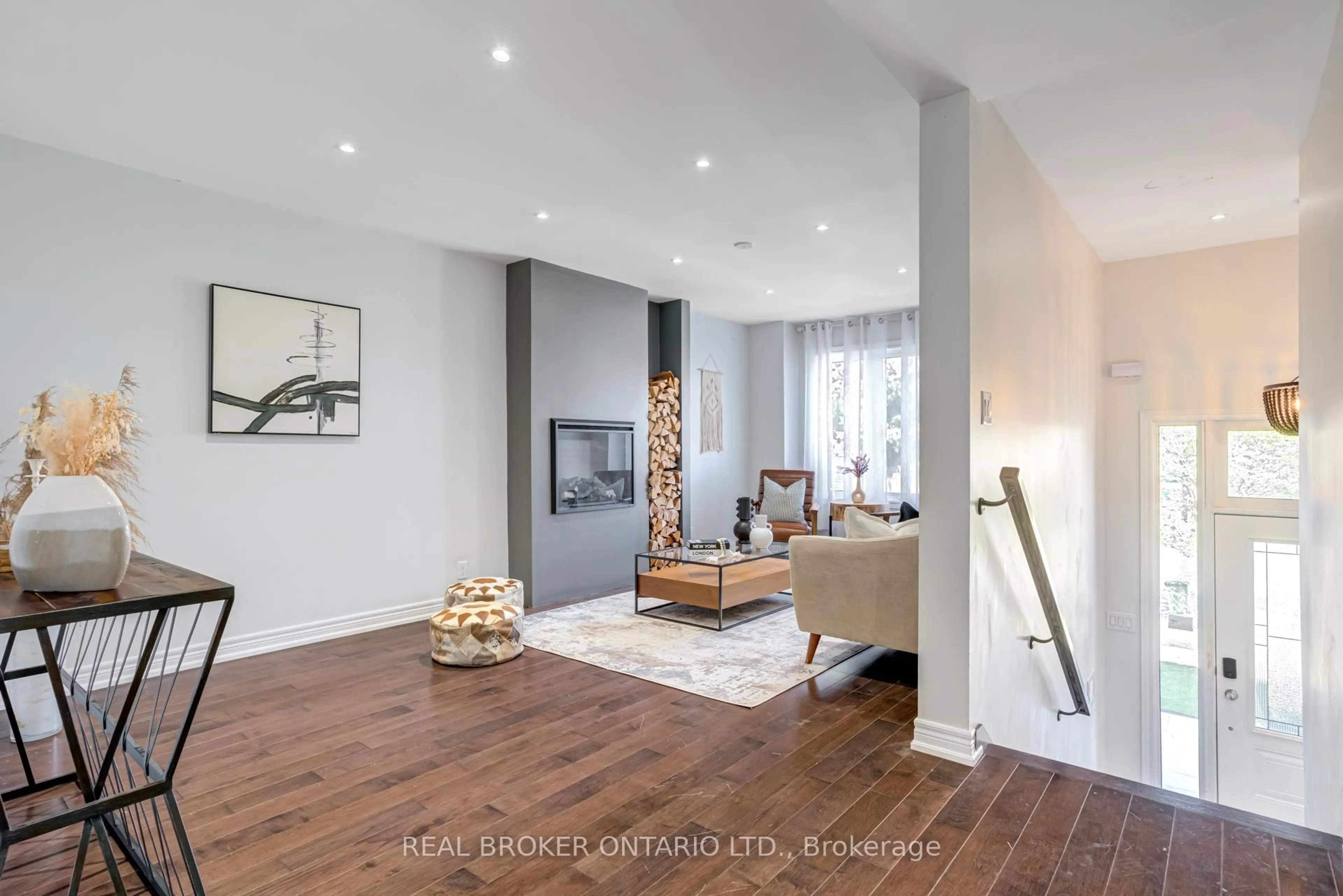 Living room with furniture, wood/laminate floor for 78B Foch Ave, Toronto Ontario M8W 3X4