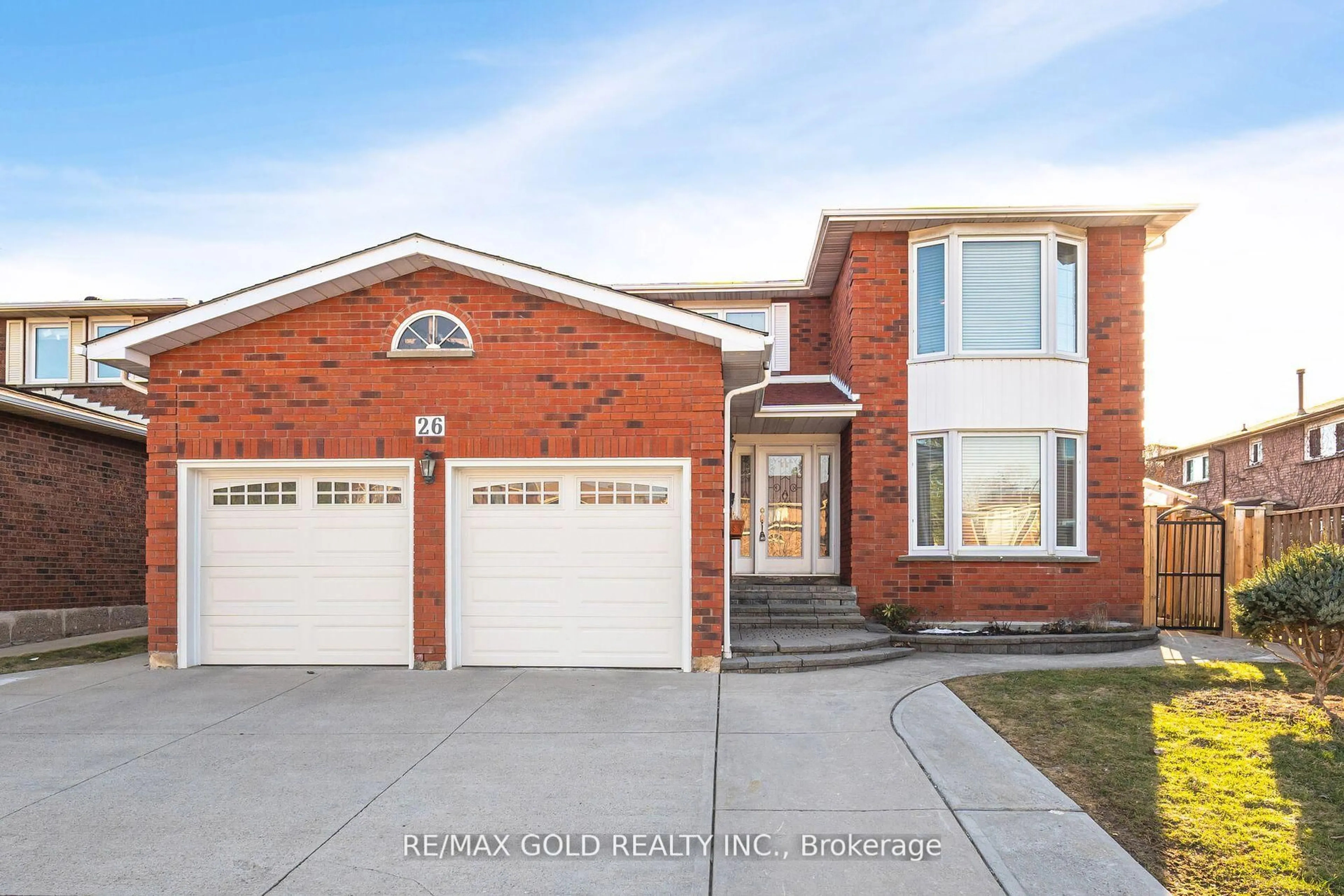 Home with brick exterior material, street for 26 Mossbank Dr, Brampton Ontario L6W 3Z3