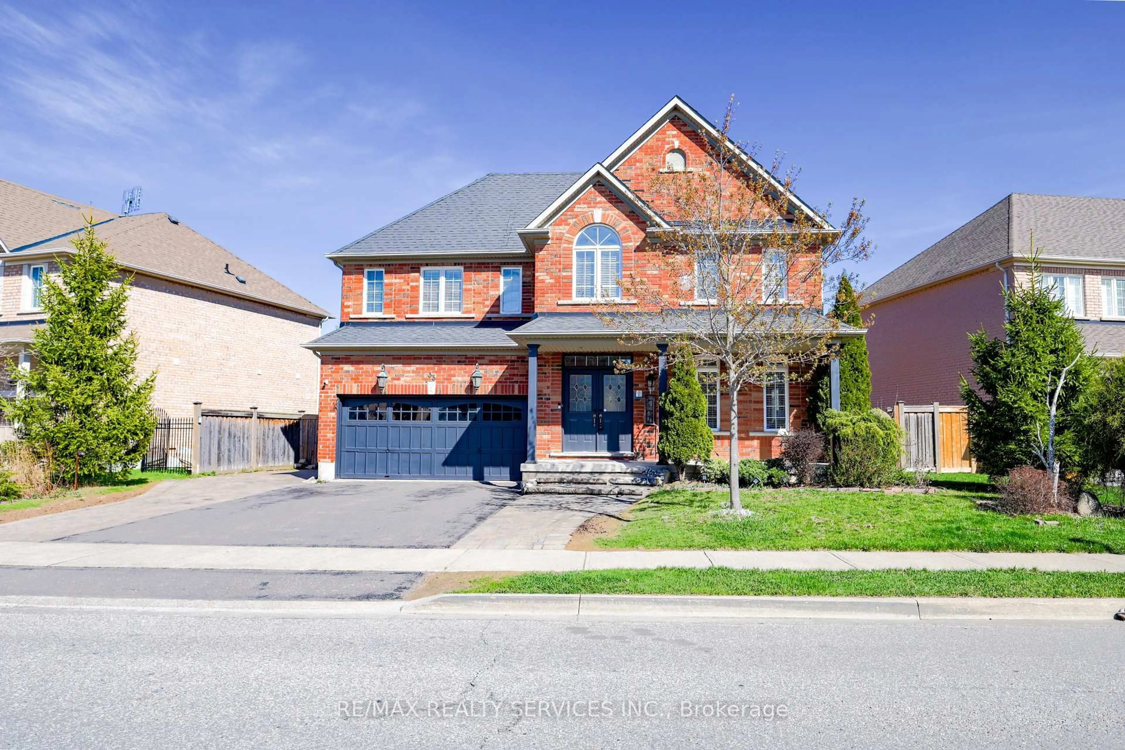 Home with brick exterior material, street for 33 Leparc Rd, Brampton Ontario L6P 2W9