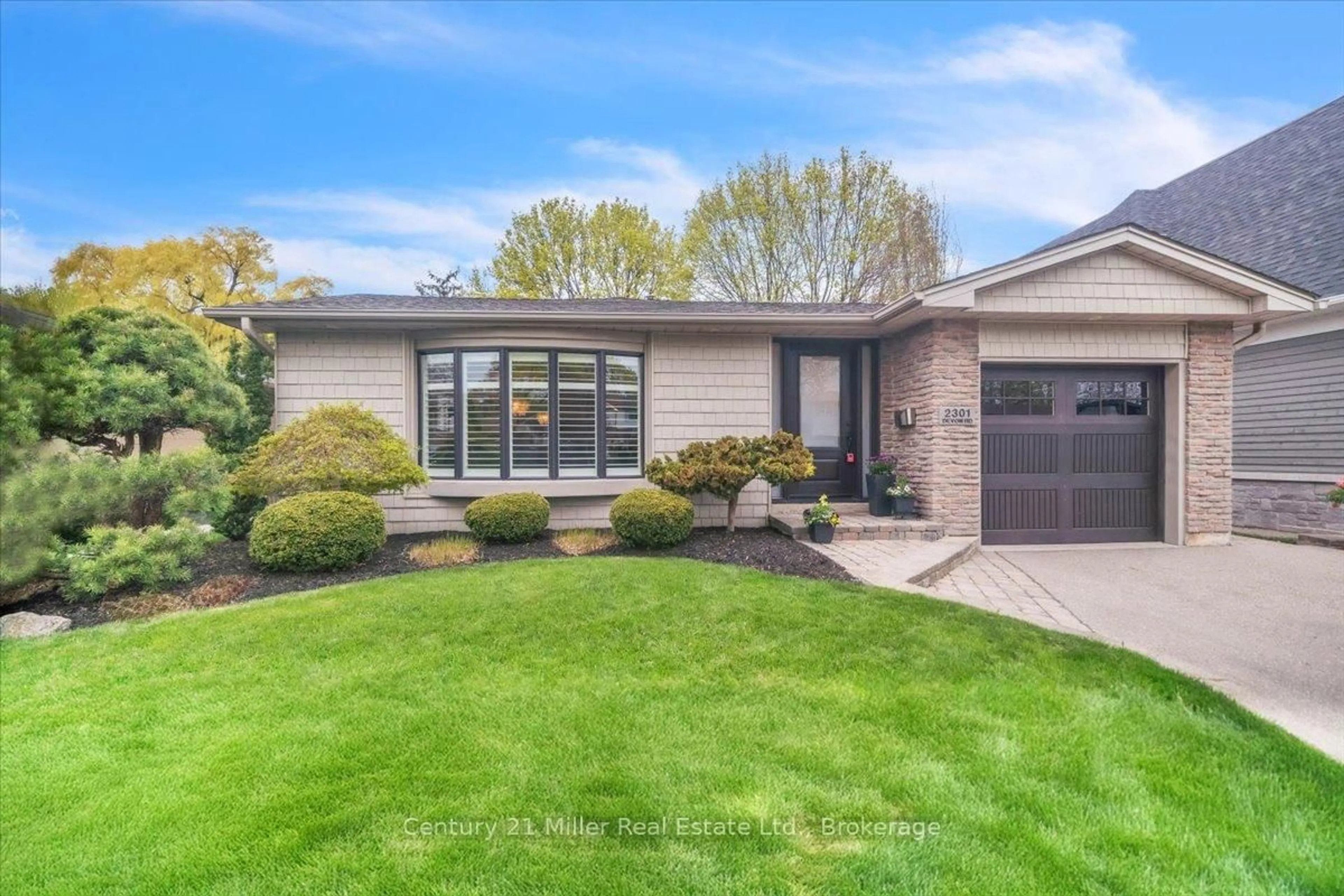 Home with brick exterior material, street for 2301 Devon Rd, Oakville Ontario L6J 5R2