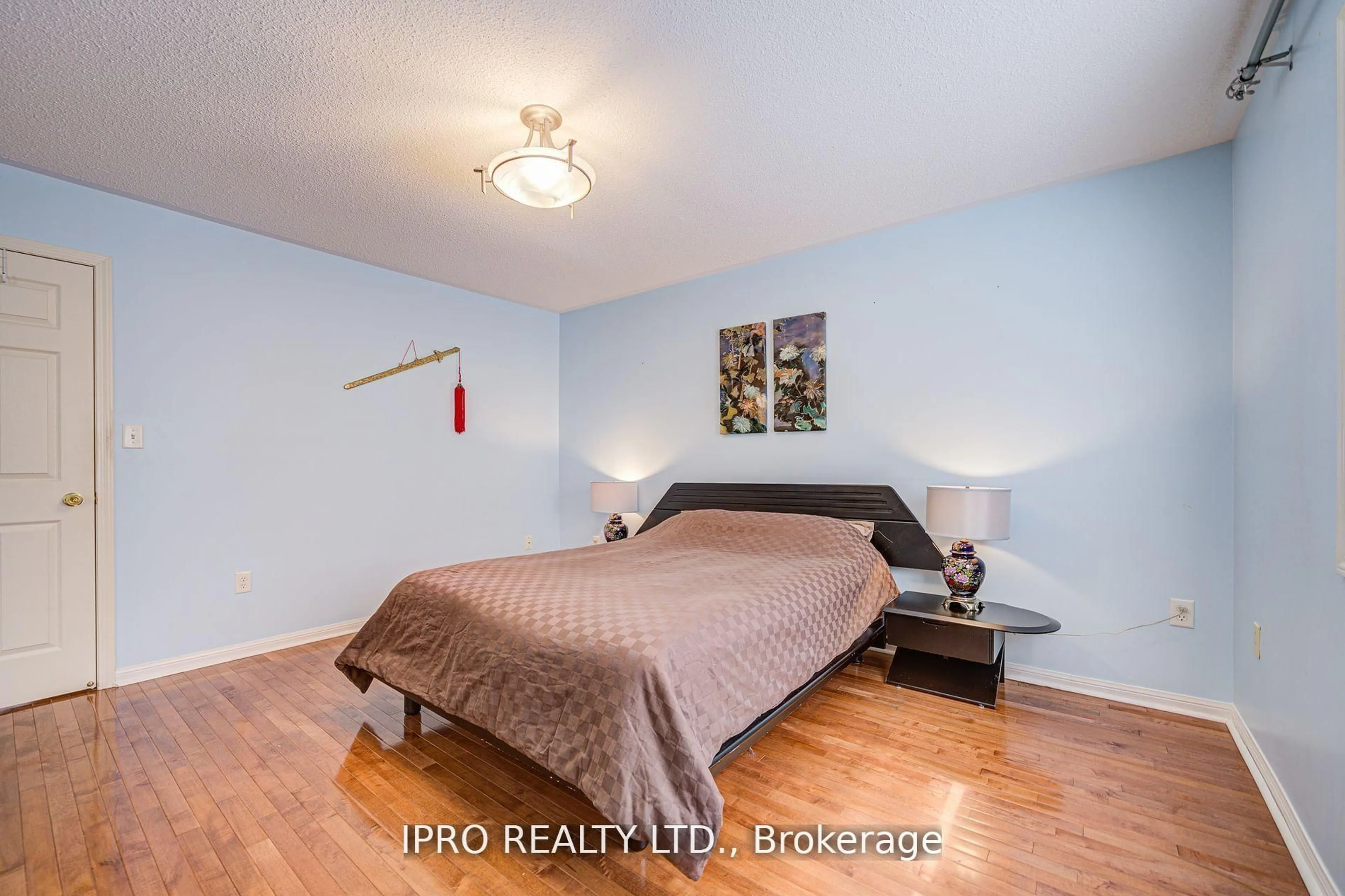 Bedroom with bed, wood/laminate floor for 7 Bonavista Dr, Brampton Ontario L6X 0N2