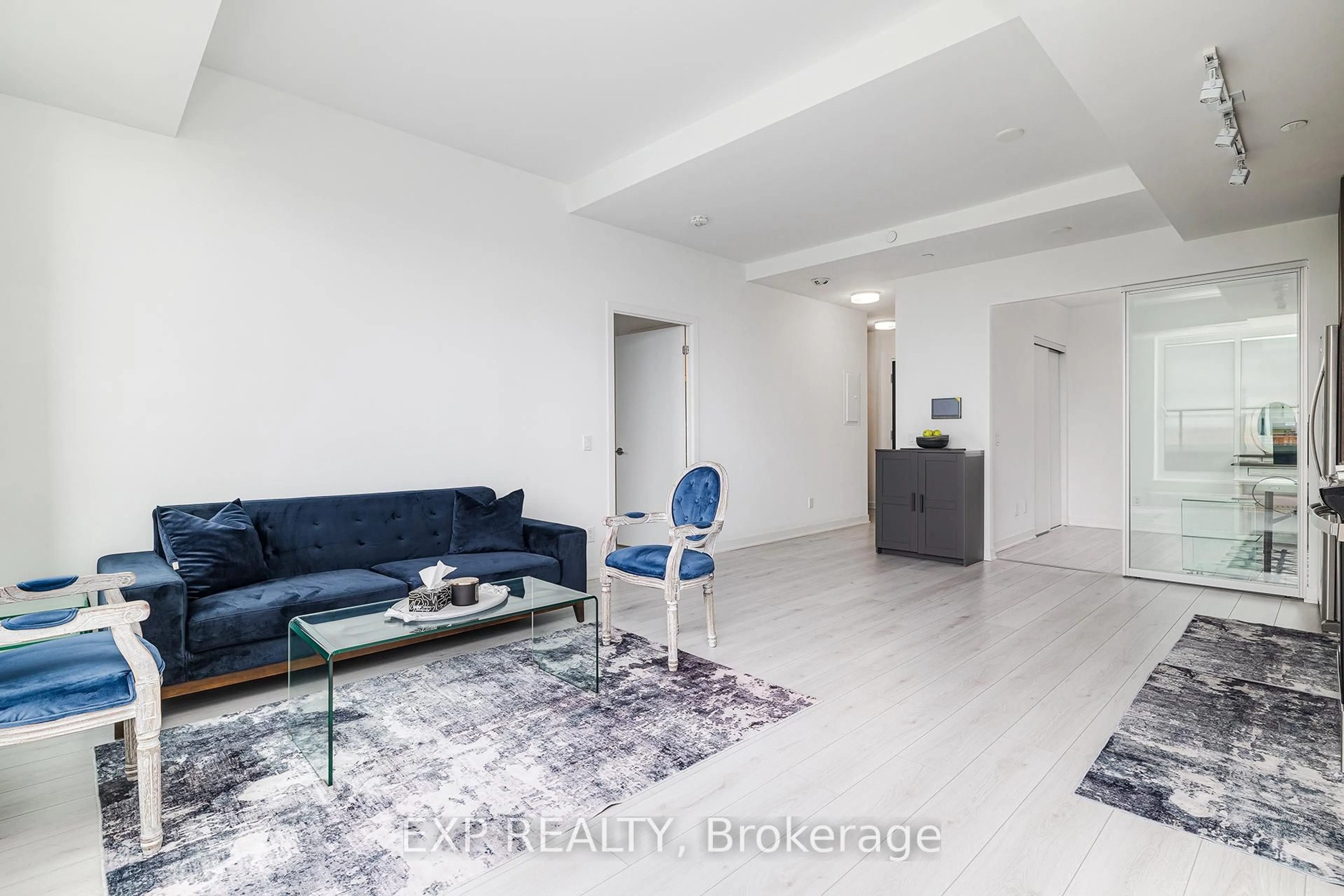 Living room with furniture, unknown for 405 Dundas St #307, Oakville Ontario L6M 5P9