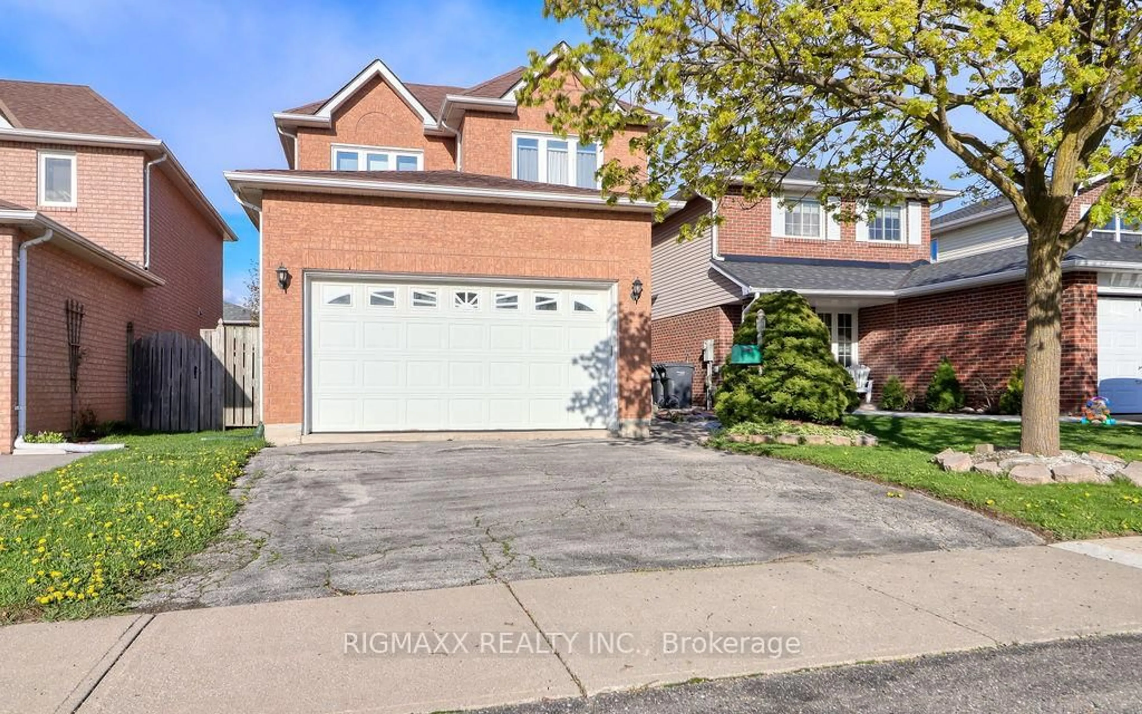 Home with brick exterior material, street for 14 Sunshade Pl, Brampton Ontario L6Z 2B8