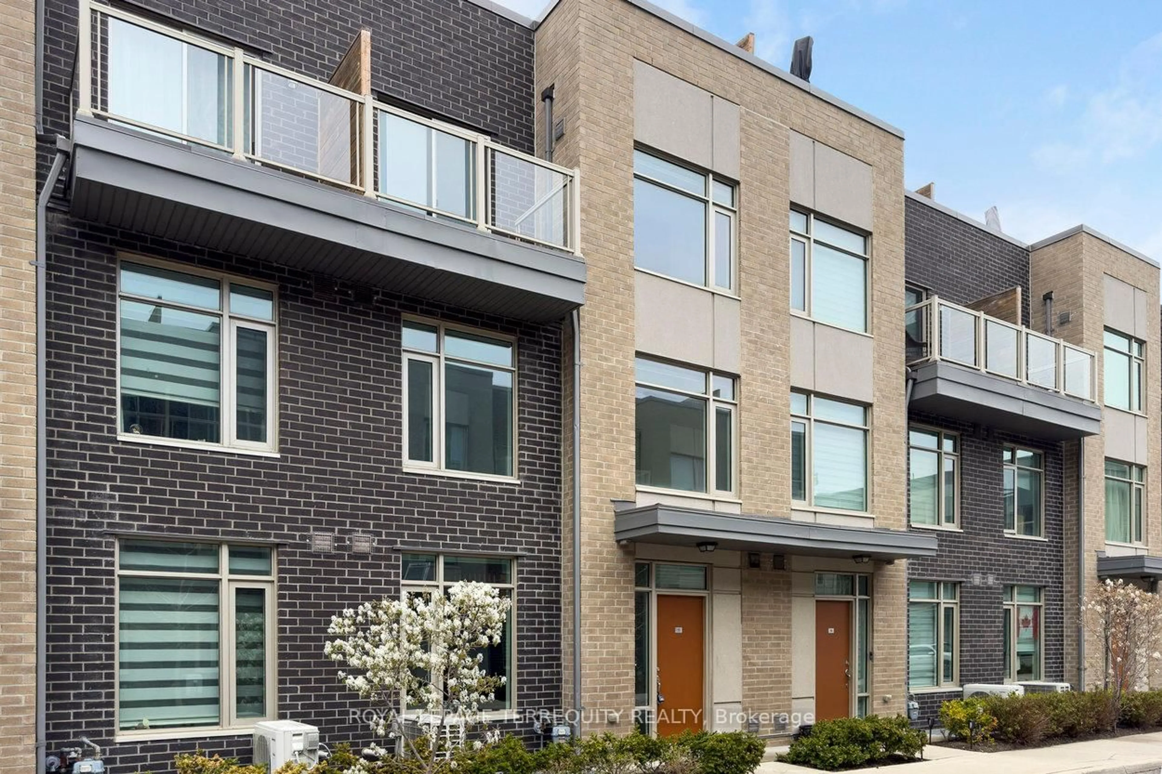 Home with brick exterior material, street for 35 Applewood Lane #53, Toronto Ontario M9C 0C1