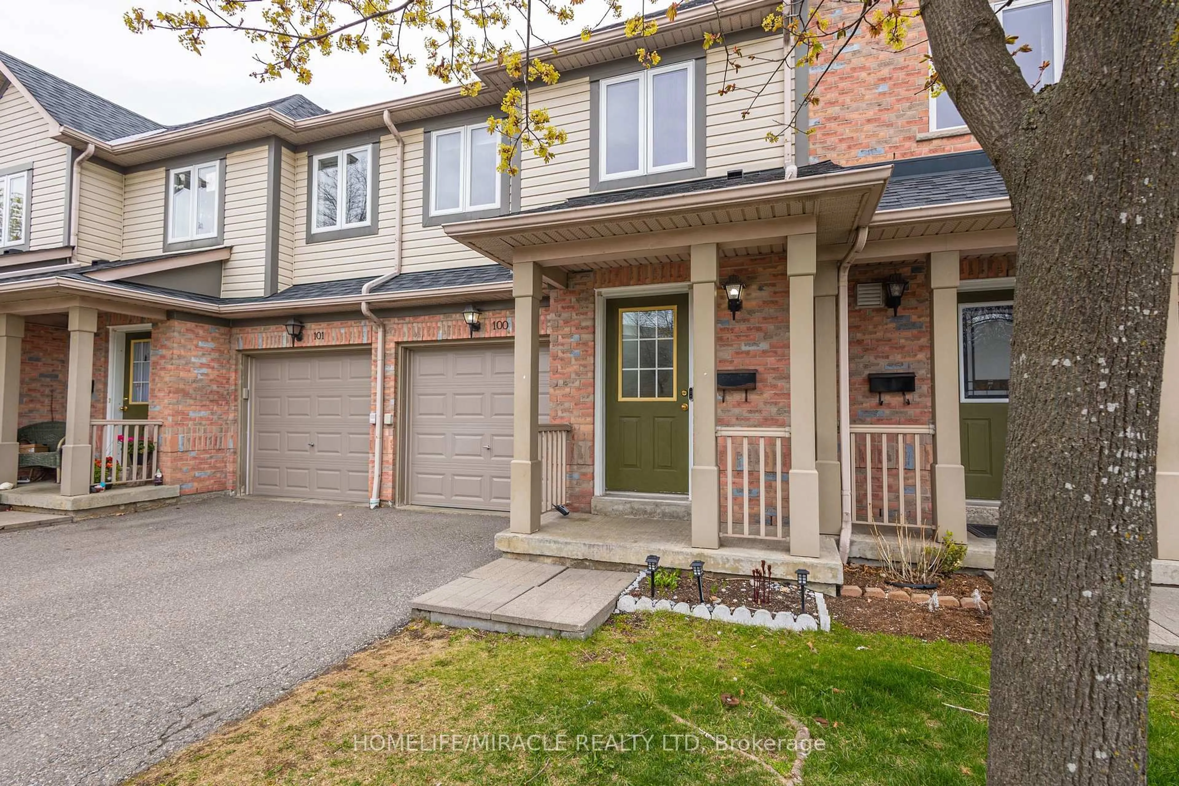 Home with brick exterior material, street for 5255 Guildwood Way #100, Mississauga Ontario L5R 4A9