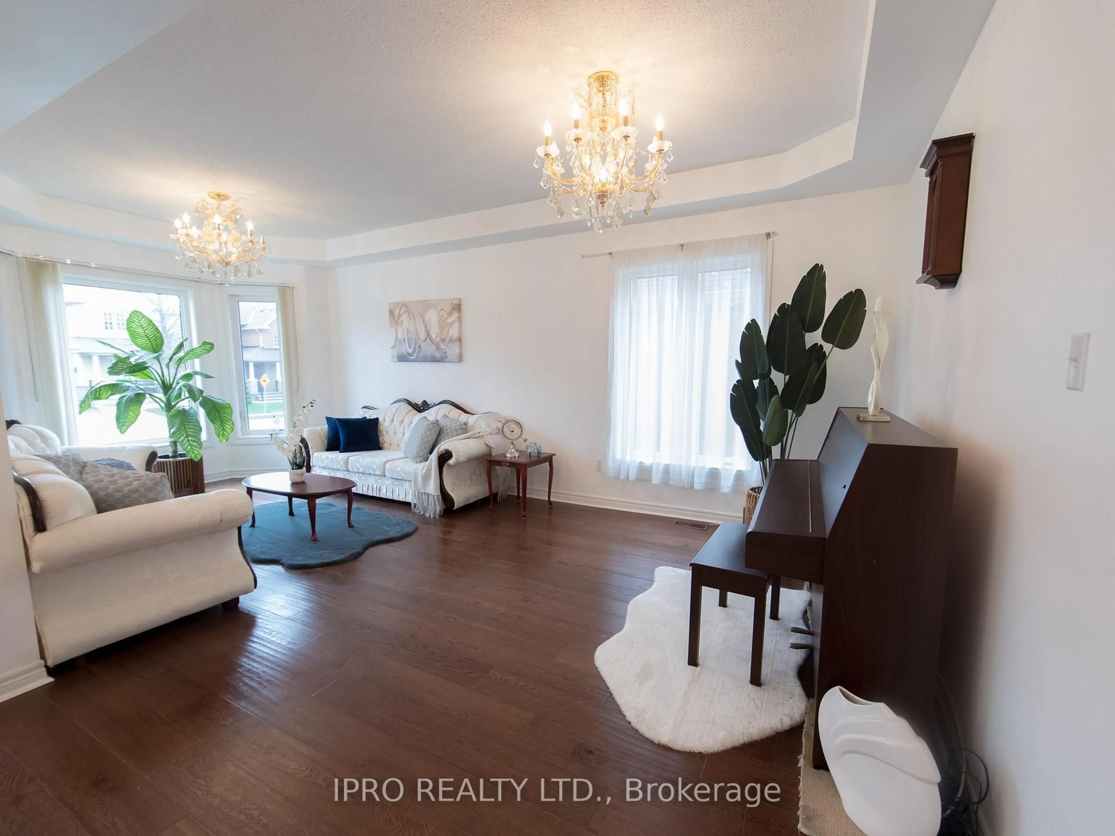 Living room with furniture, wood/laminate floor for 94 Octillo Blvd, Brampton Ontario L6R 2V6