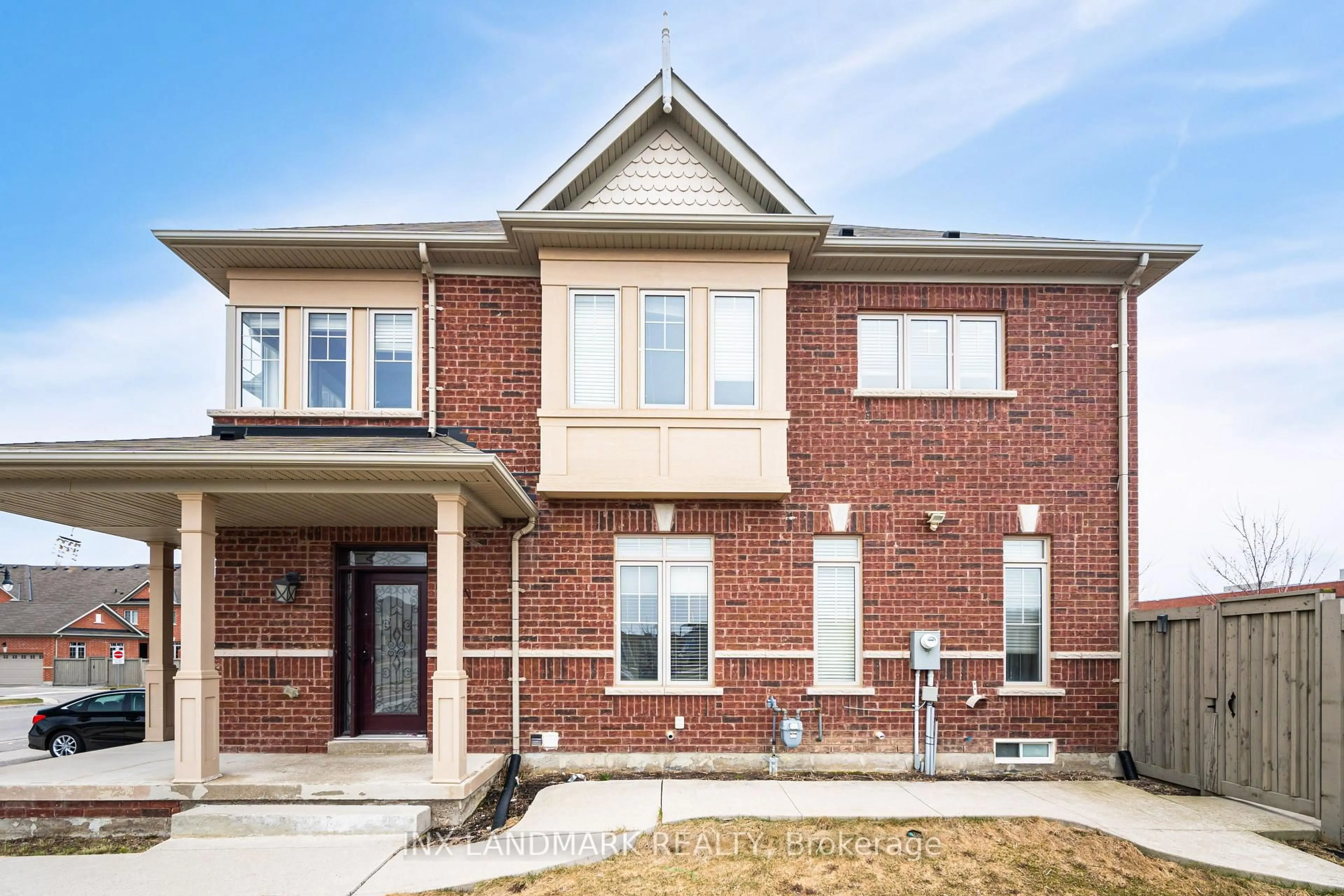 Home with brick exterior material, street for 125 Remembrance Rd, Brampton Ontario L7A 0A8
