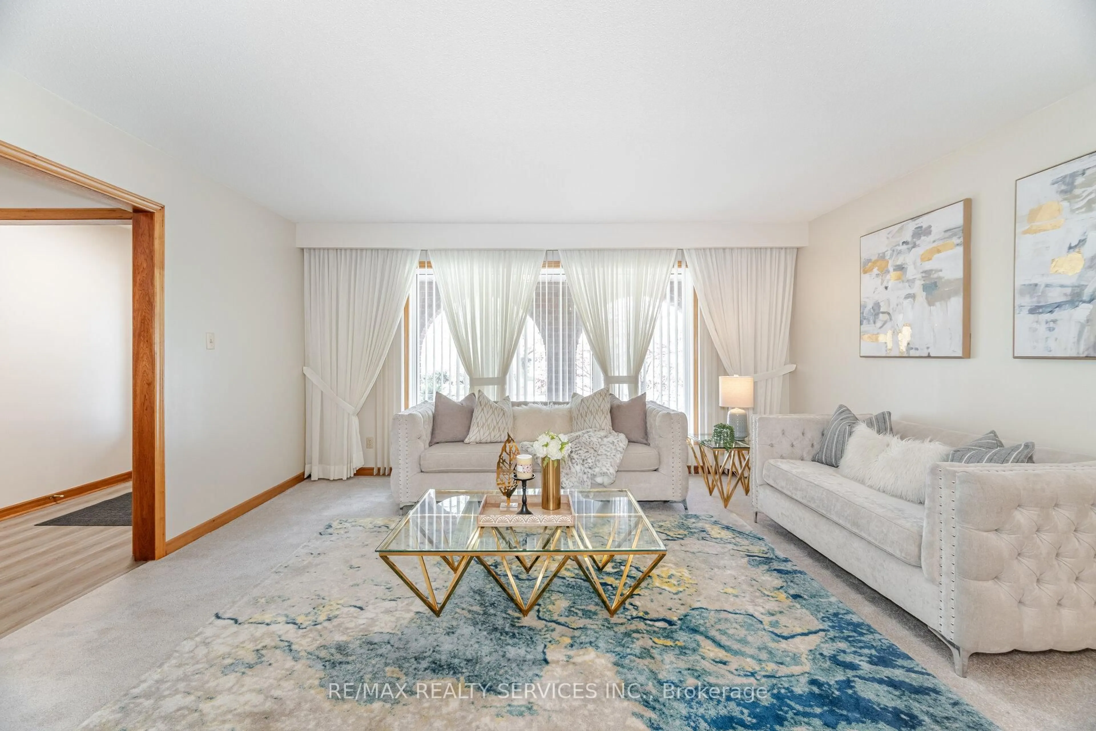 Living room with furniture, carpet floor for 75 Curtis Dr, Brampton Ontario L6Y 2J6