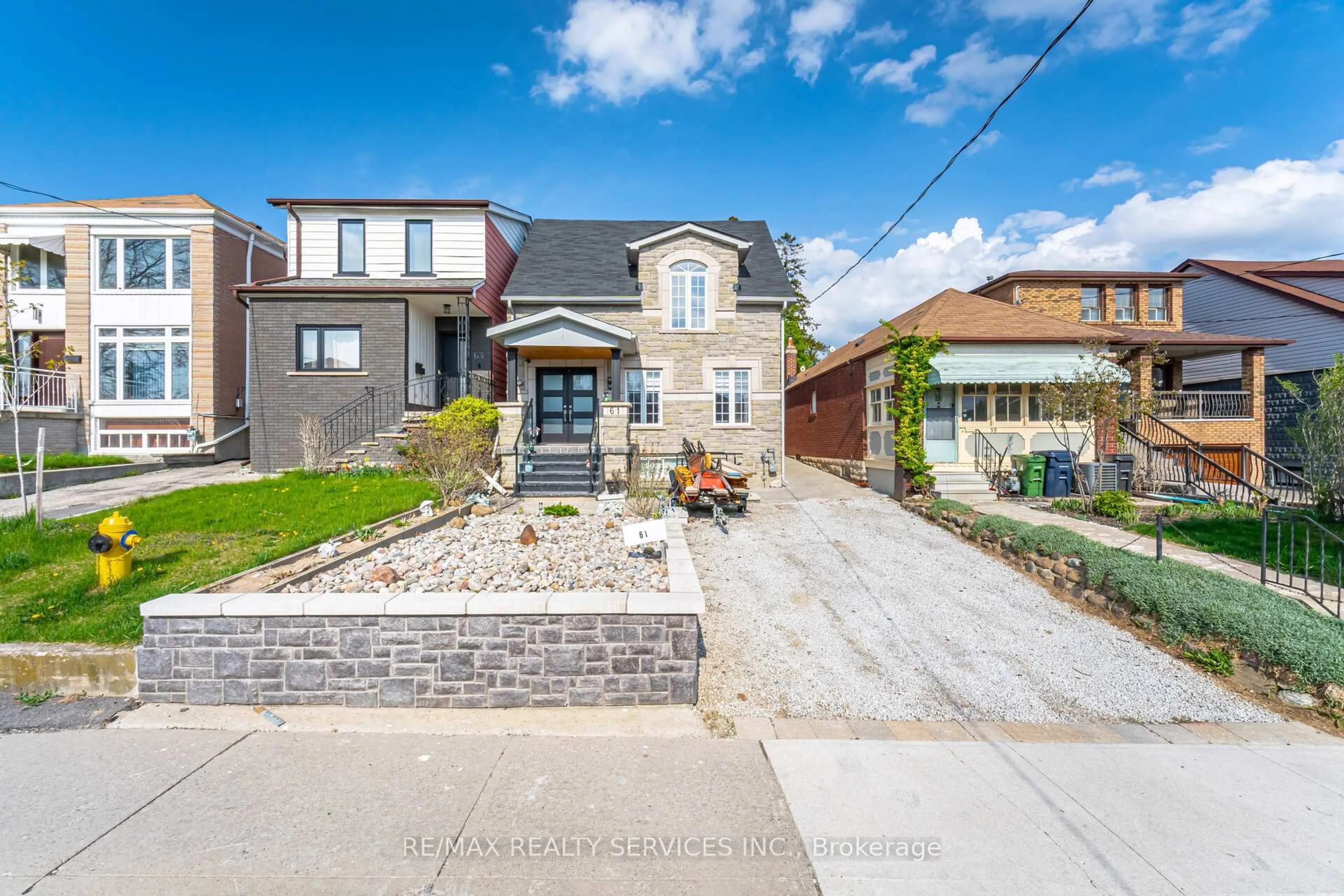 Home with brick exterior material, street for 61 Branstone Rd, Toronto Ontario M6E 4E3