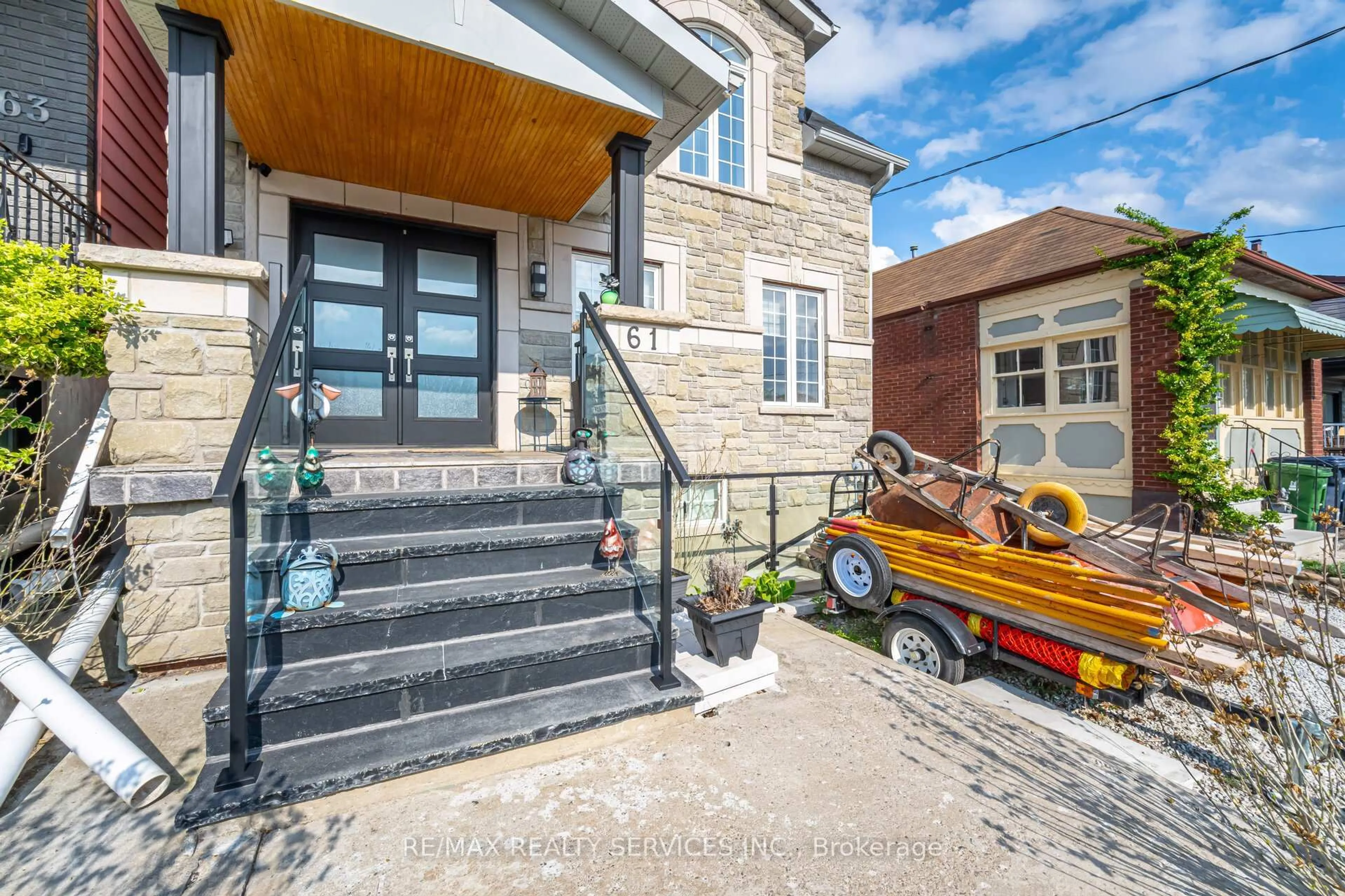 Home with brick exterior material, street for 61 Branstone Rd, Toronto Ontario M6E 4E3