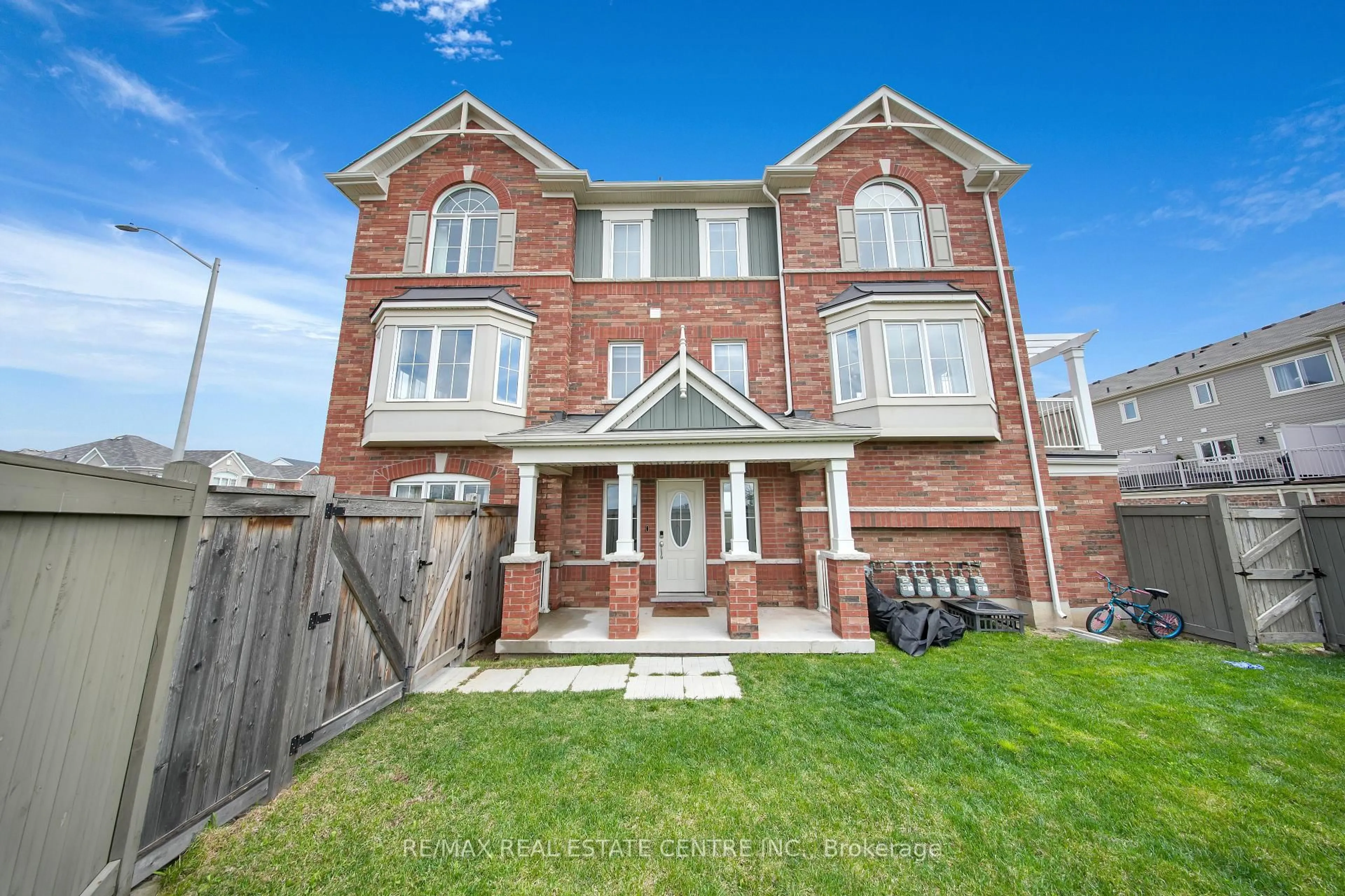 Home with brick exterior material, street for 100 Whitlock Ave, Milton Ontario L9T 7K6