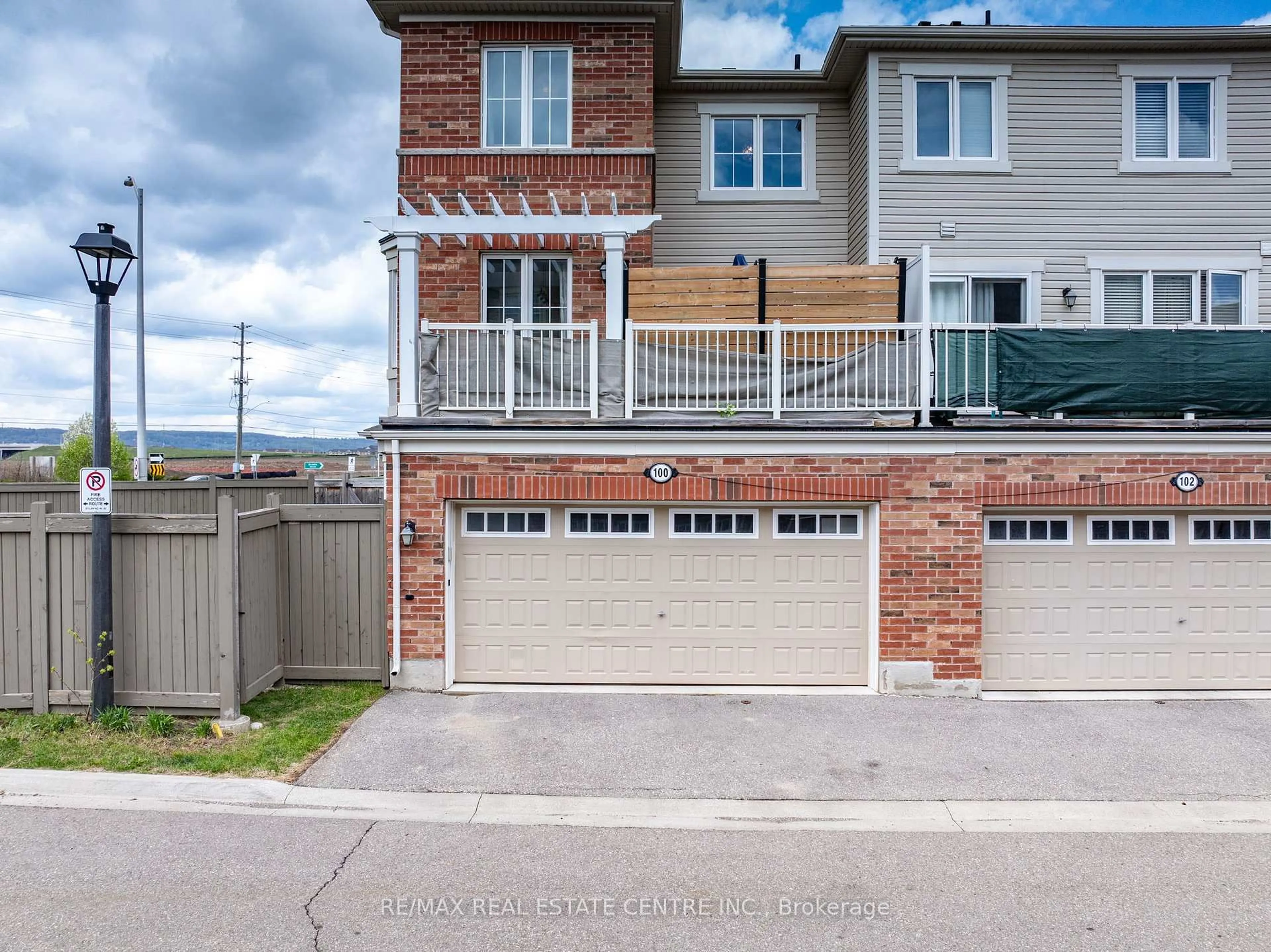 A pic from outside/outdoor area/front of a property/back of a property/a pic from drone, street for 100 Whitlock Ave, Milton Ontario L9T 7K6