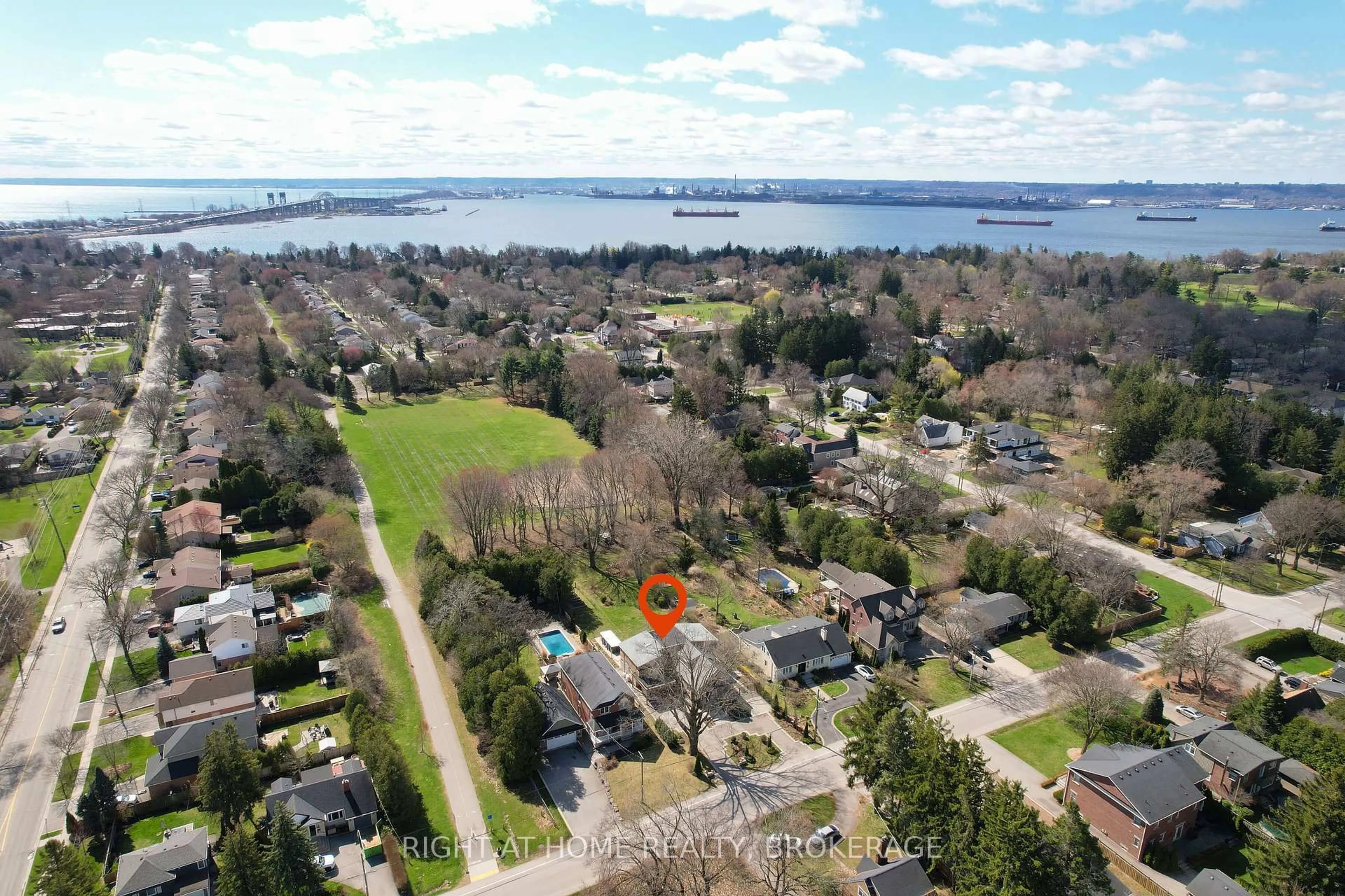 A pic from outside/outdoor area/front of a property/back of a property/a pic from drone, water/lake/river/ocean view for 704 Cedar Ave, Burlington Ontario L7T 2R7