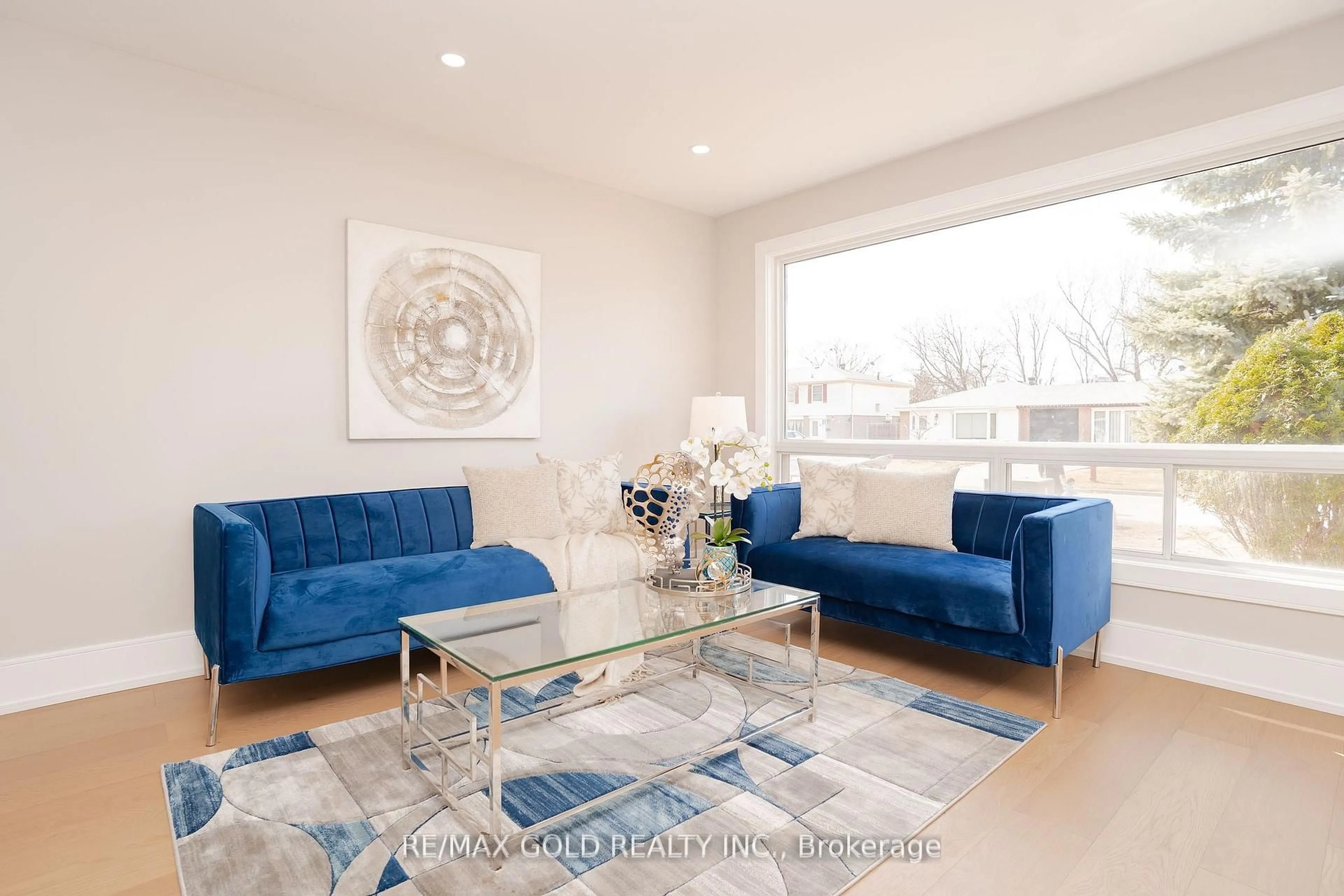 Living room with furniture, wood/laminate floor for 41 Danesbury Cres, Brampton Ontario L6T 1T2