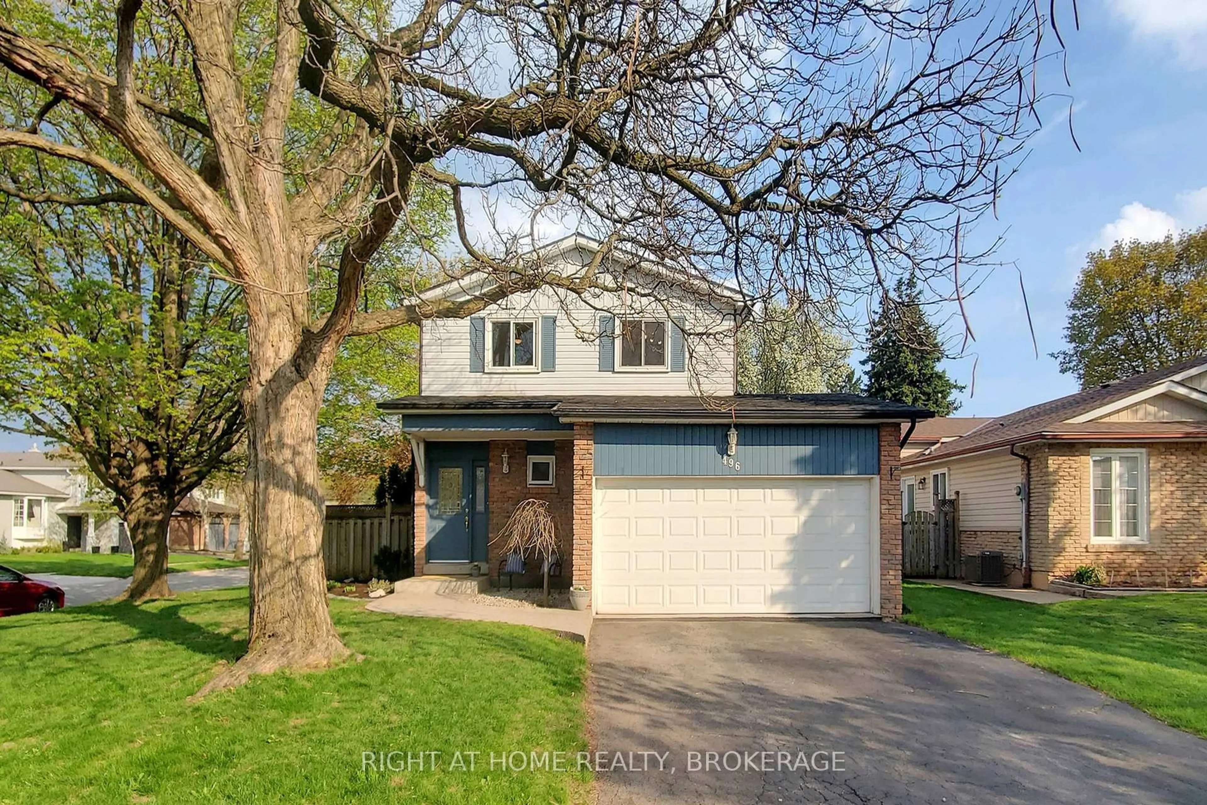 Home with vinyl exterior material, street for 496 Tipperton Cres, Oakville Ontario L6L 5C9