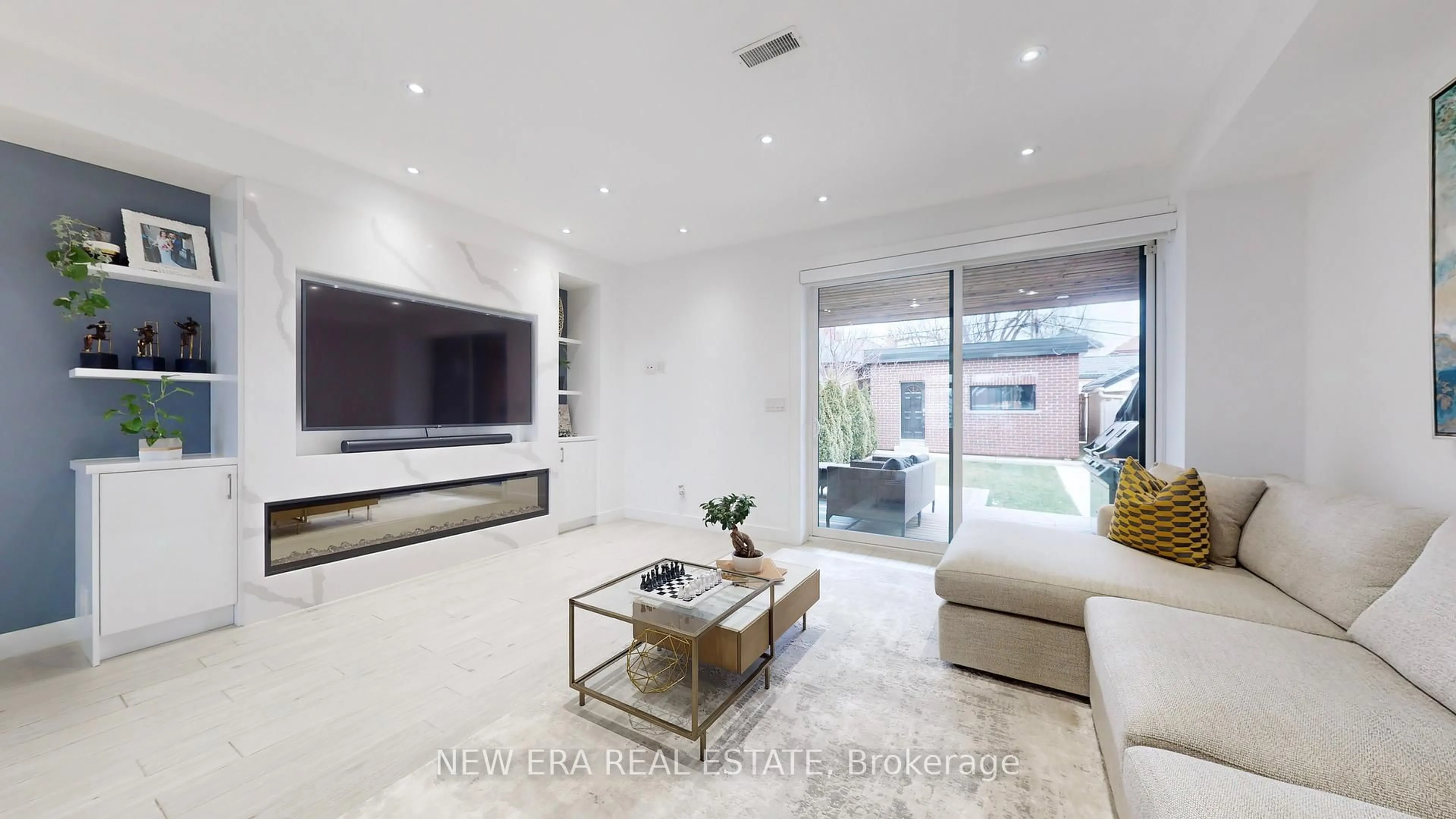Living room with furniture, ceramic/tile floor for 291 Gilbert Ave, Toronto Ontario M6E 4W8