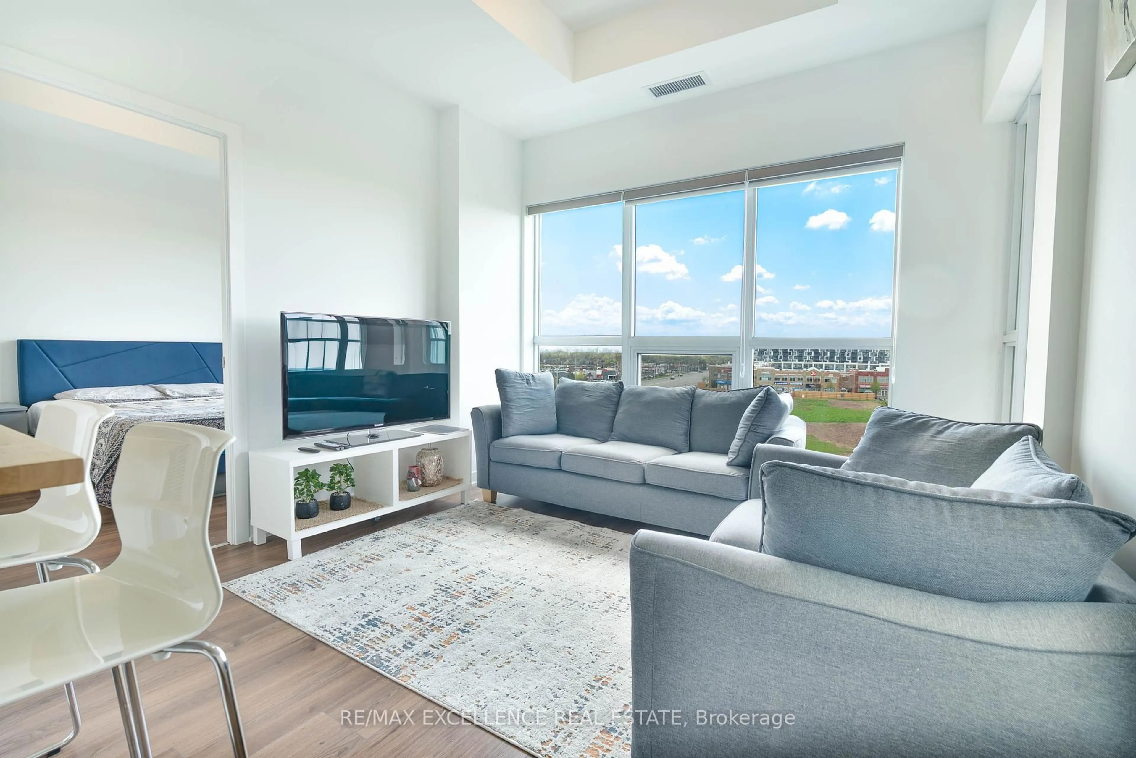 Living room with furniture, unknown for 405 Dundas St #503, Oakville Ontario L6M 4M2