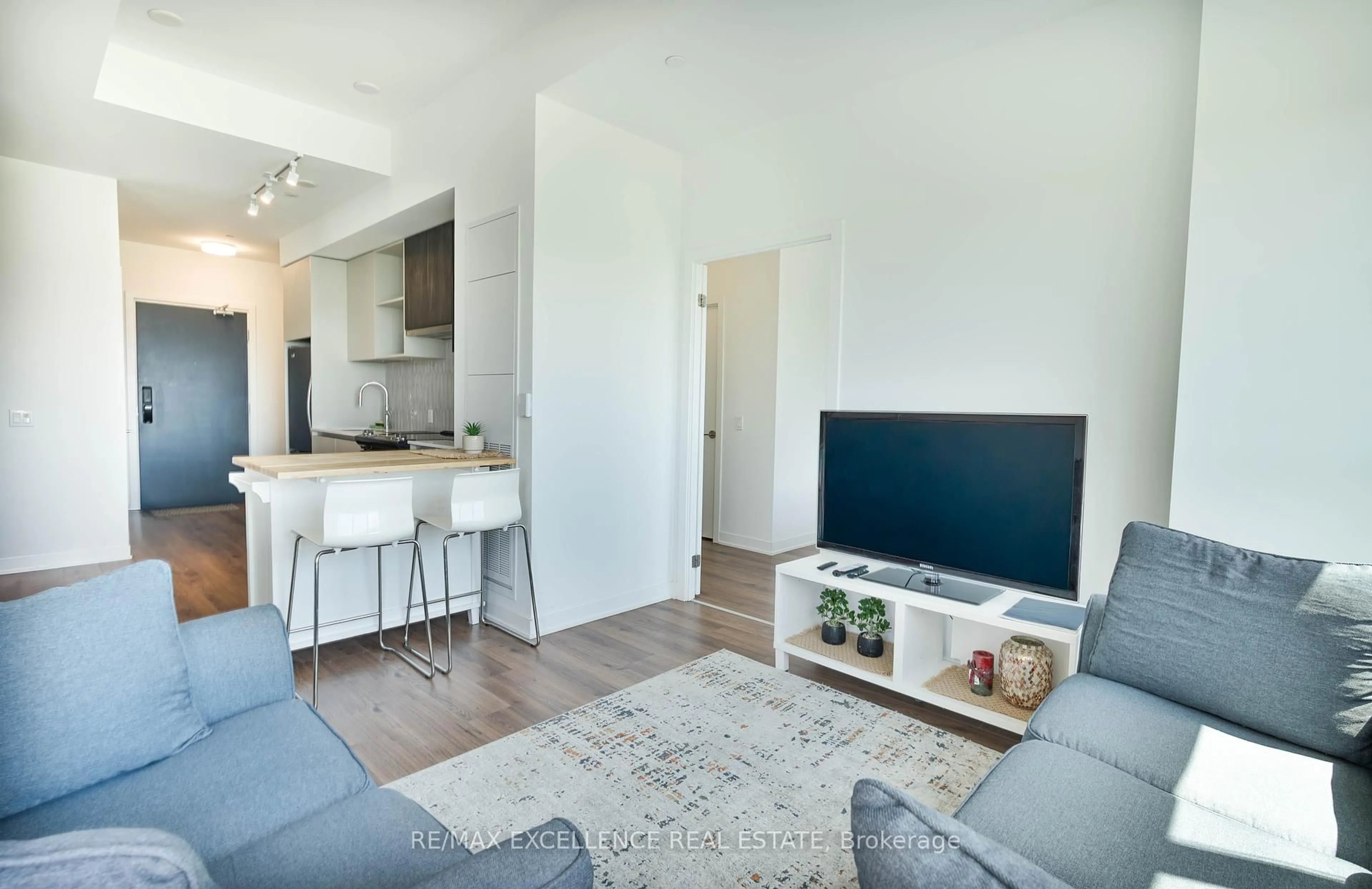 Living room with furniture, unknown for 405 Dundas St #503, Oakville Ontario L6M 4M2