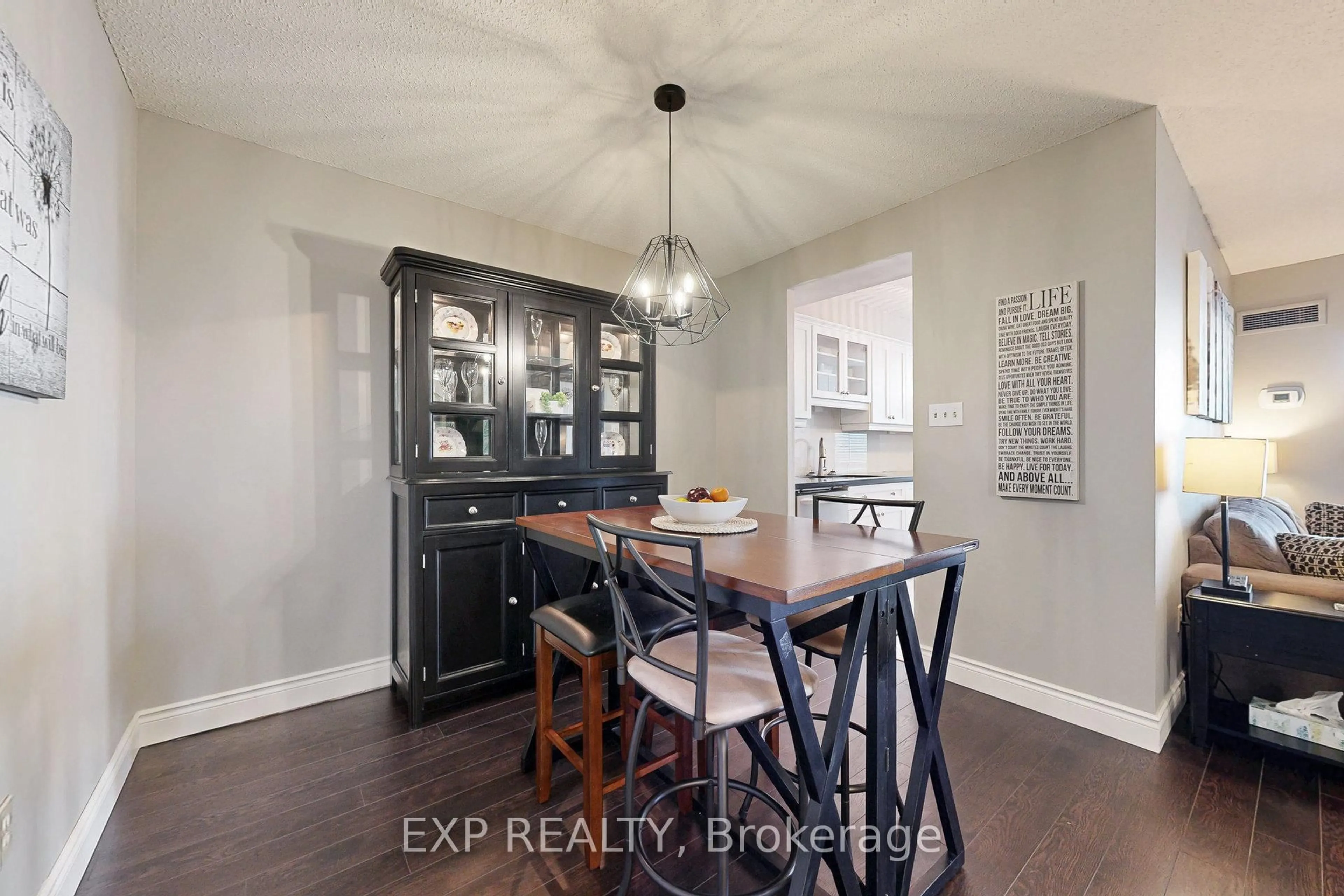 Dining room, wood/laminate floor for 5 Lisa St #1502, Brampton Ontario L6T 4T4