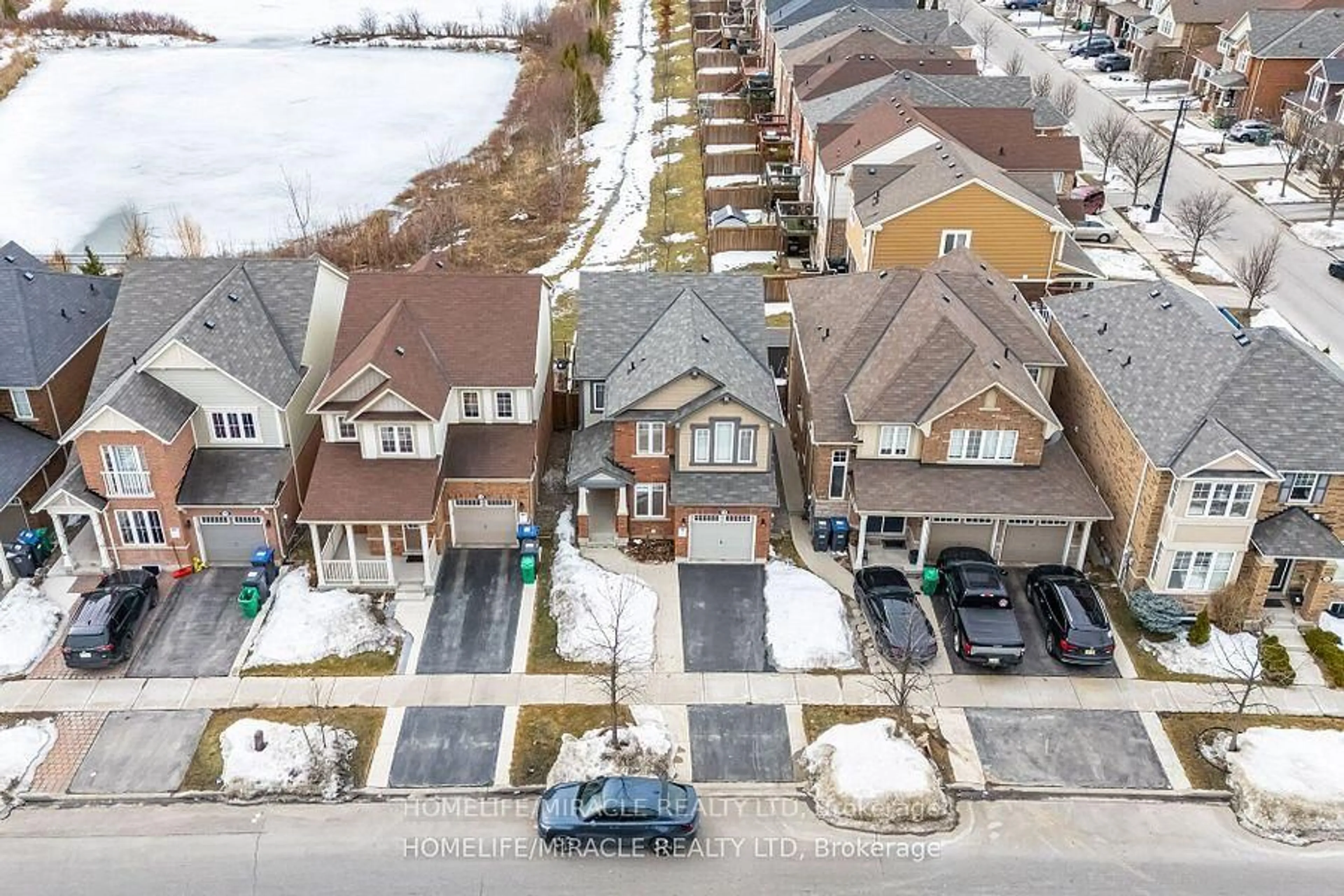 A pic from outside/outdoor area/front of a property/back of a property/a pic from drone, street for 14 Robert Parkinson Dr, Brampton Ontario L7A 0Y3