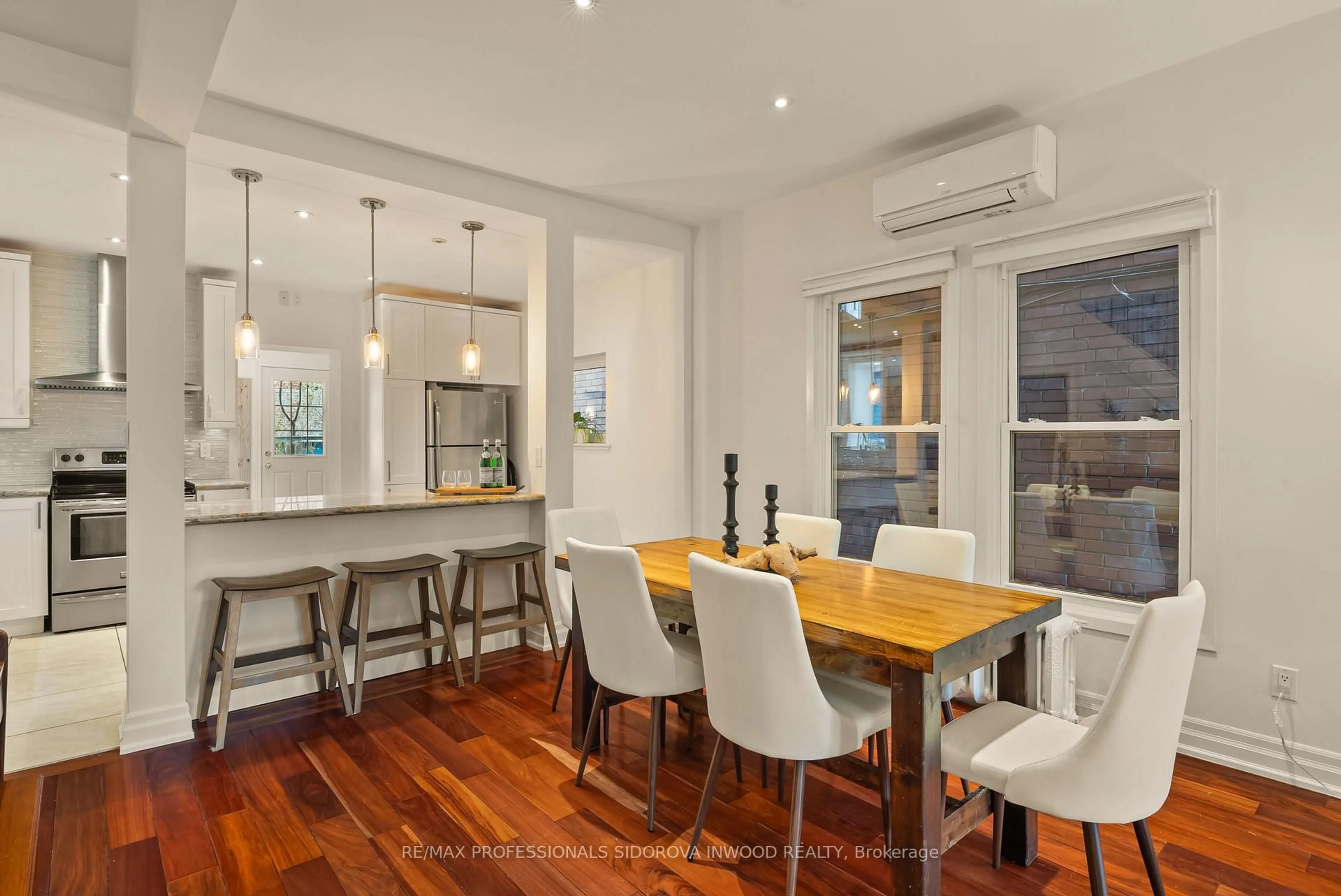 Open concept kitchen, wood/laminate floor for 173 St Johns Rd, Toronto Ontario M6P 1V2