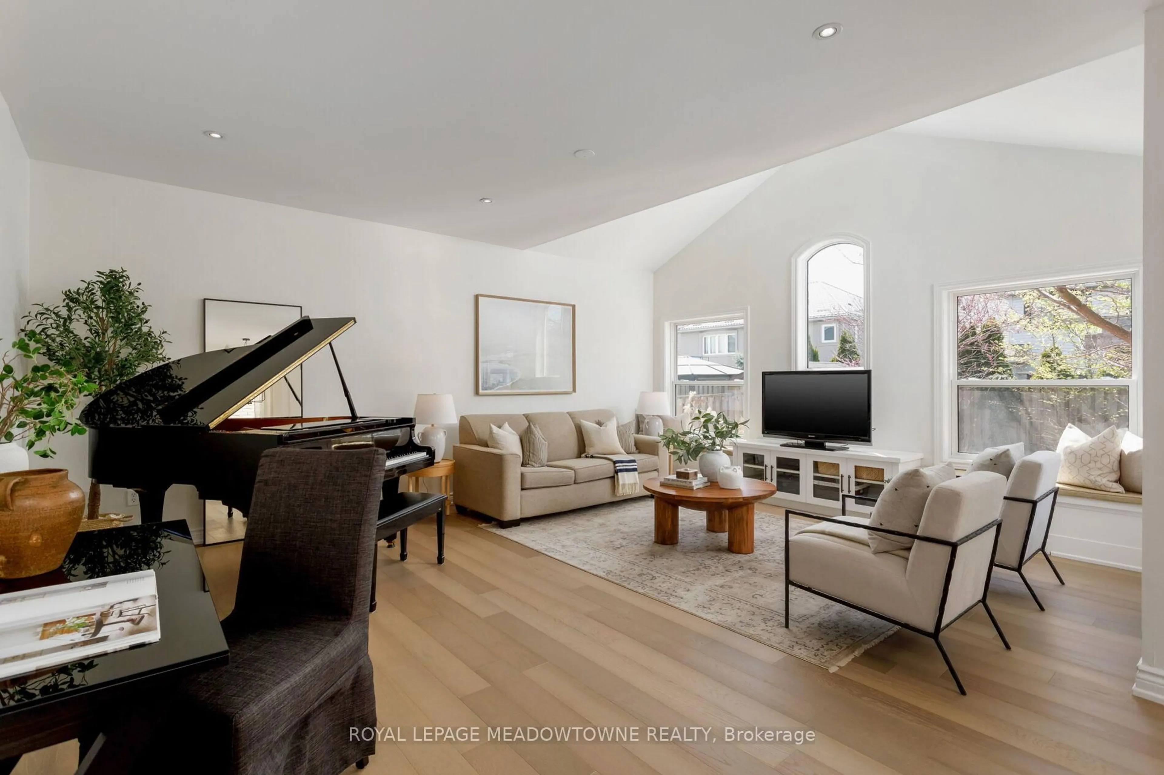 Living room with furniture, wood/laminate floor for 1083 Easterbrook Cres, Milton Ontario L9T 0C3