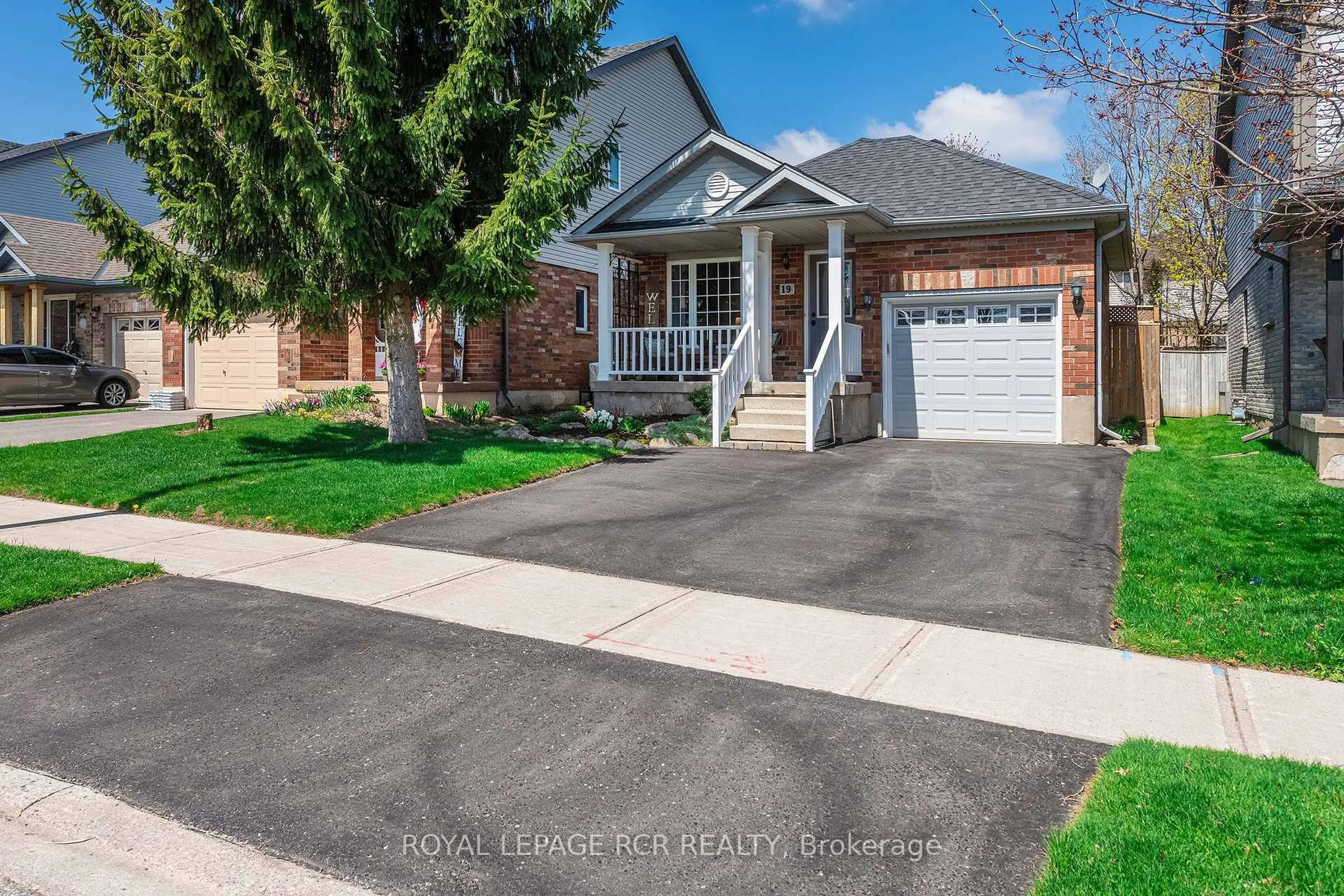 Home with brick exterior material, street for 19 Settlers Rd, Orangeville Ontario L9W 5B2