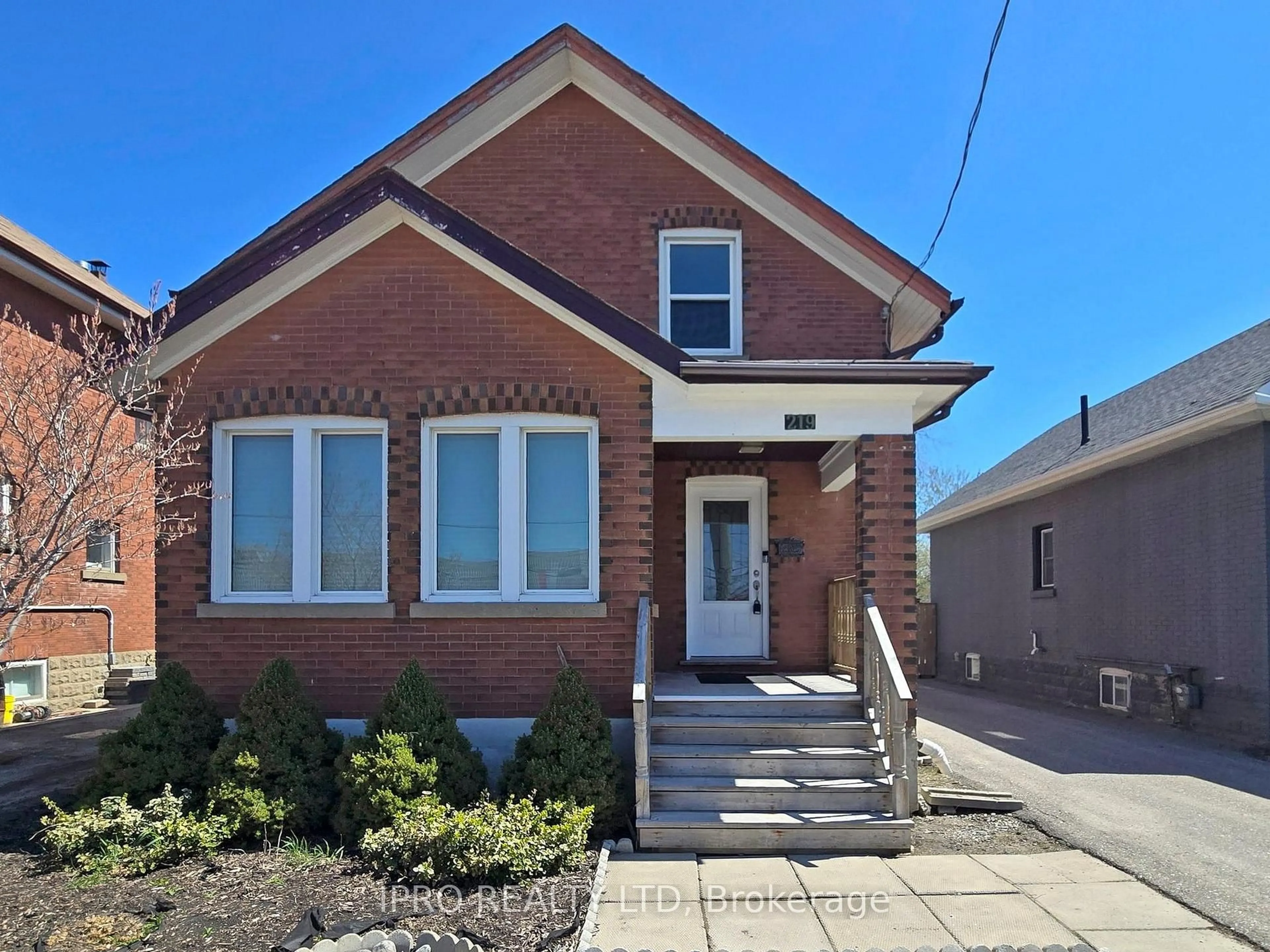 Home with brick exterior material, street for 219 Queen St, Brampton Ontario L6Y 1M6