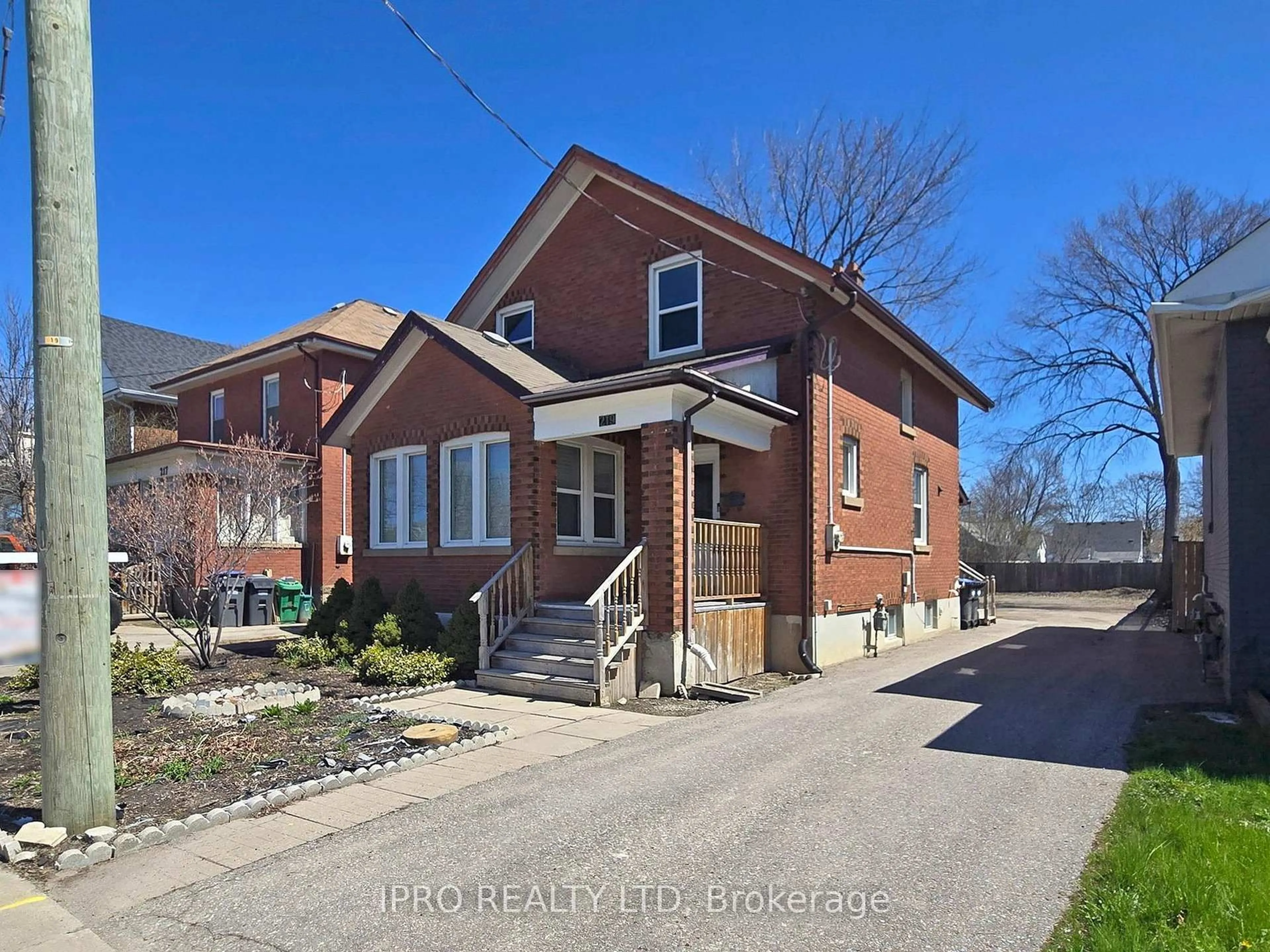 Home with brick exterior material, street for 219 Queen St, Brampton Ontario L6Y 1M6
