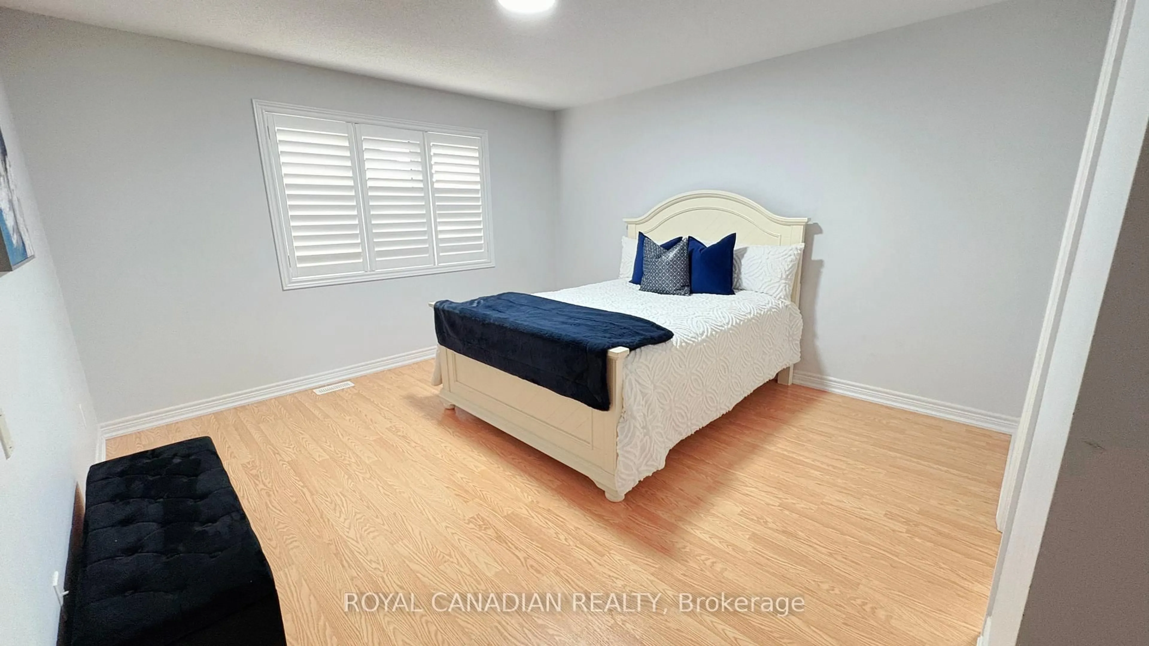 Bedroom with bed, wood/laminate floor for 8 Templar St, Brampton Ontario L6Y 2Y2