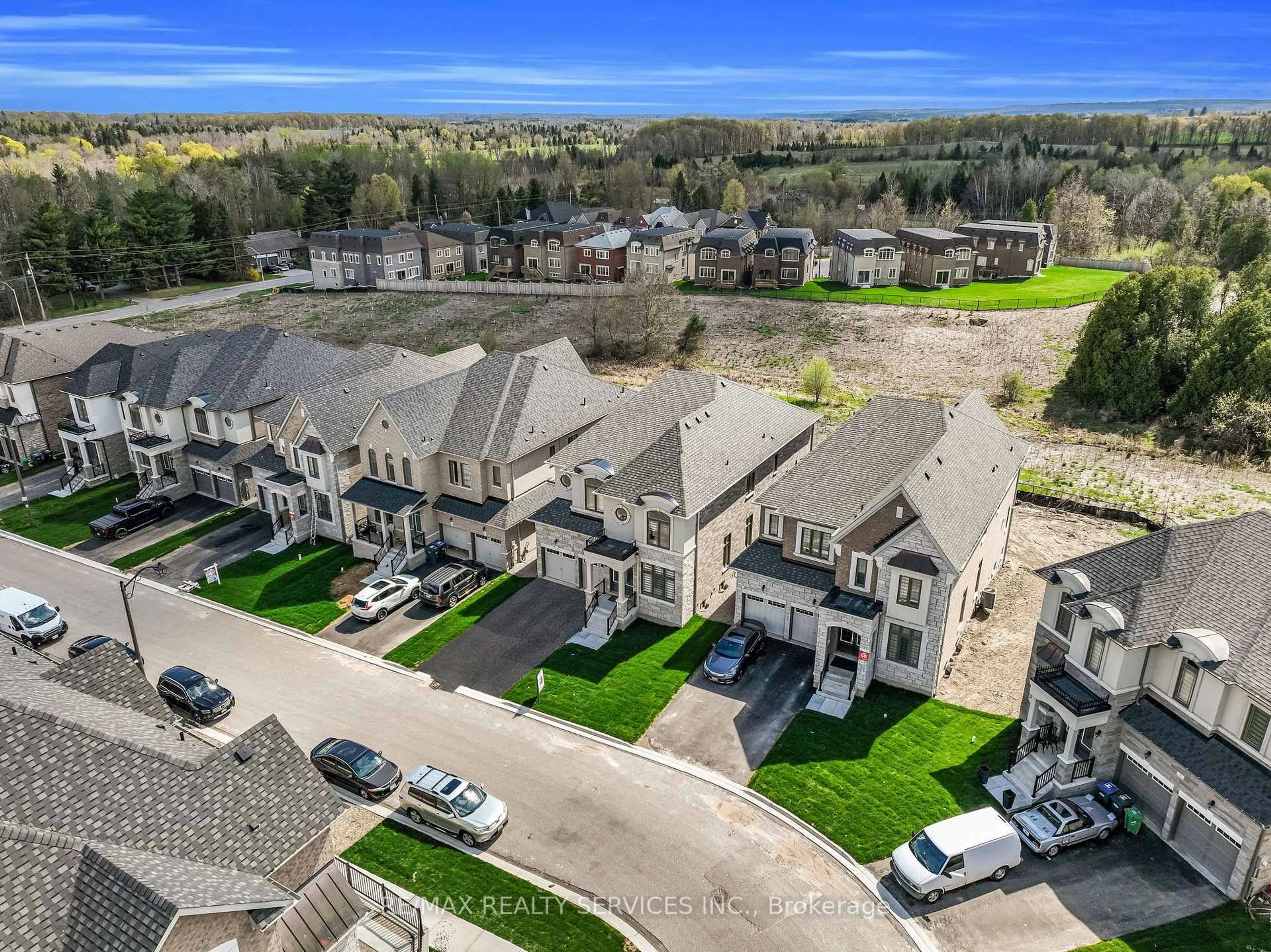 A pic from outside/outdoor area/front of a property/back of a property/a pic from drone, unknown for 67 James Walker Ave, Caledon Ontario L7C 4M8