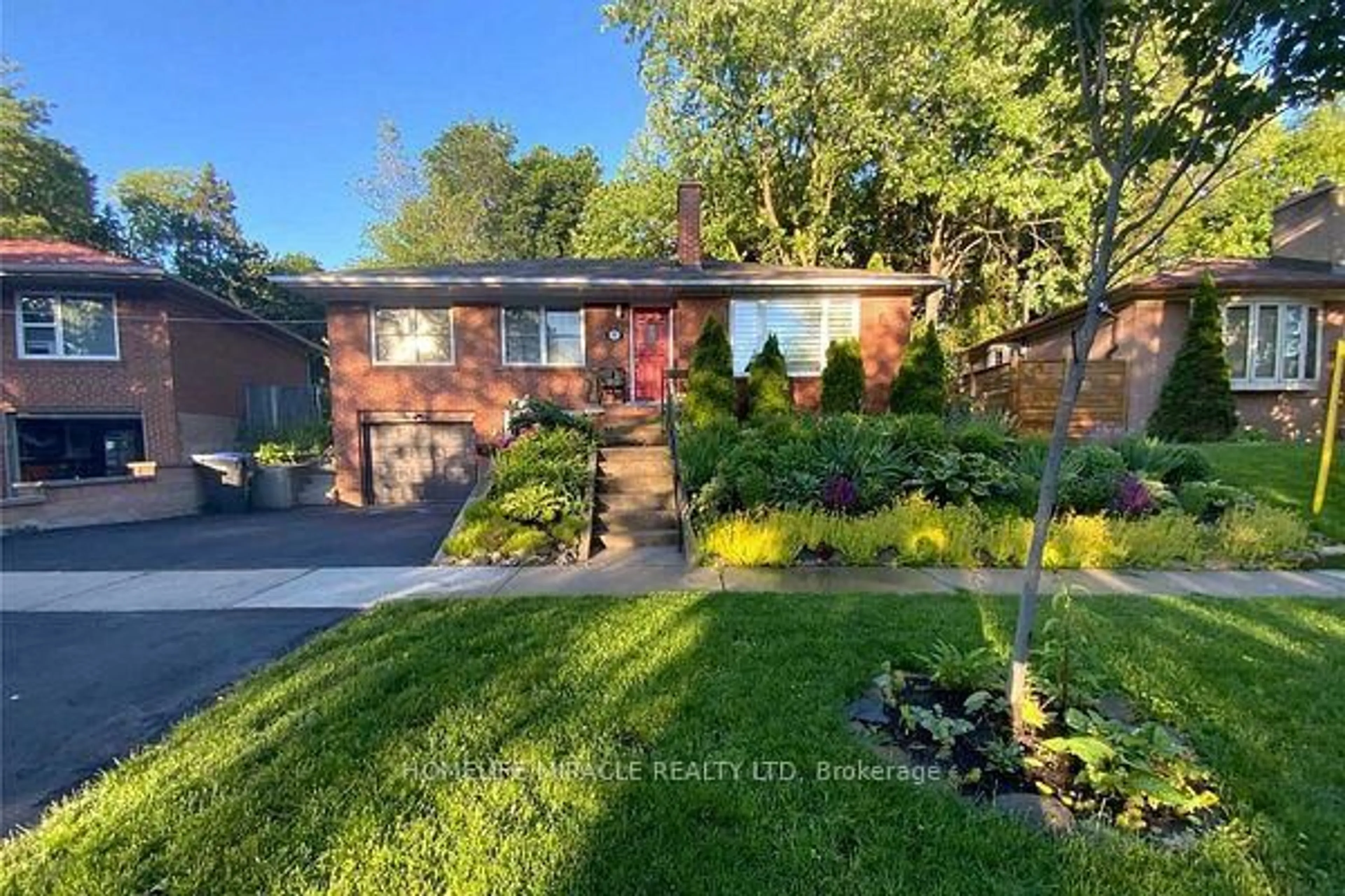 Home with brick exterior material, street for 37 Meadowland Dr, Brampton Ontario L6W 2R5