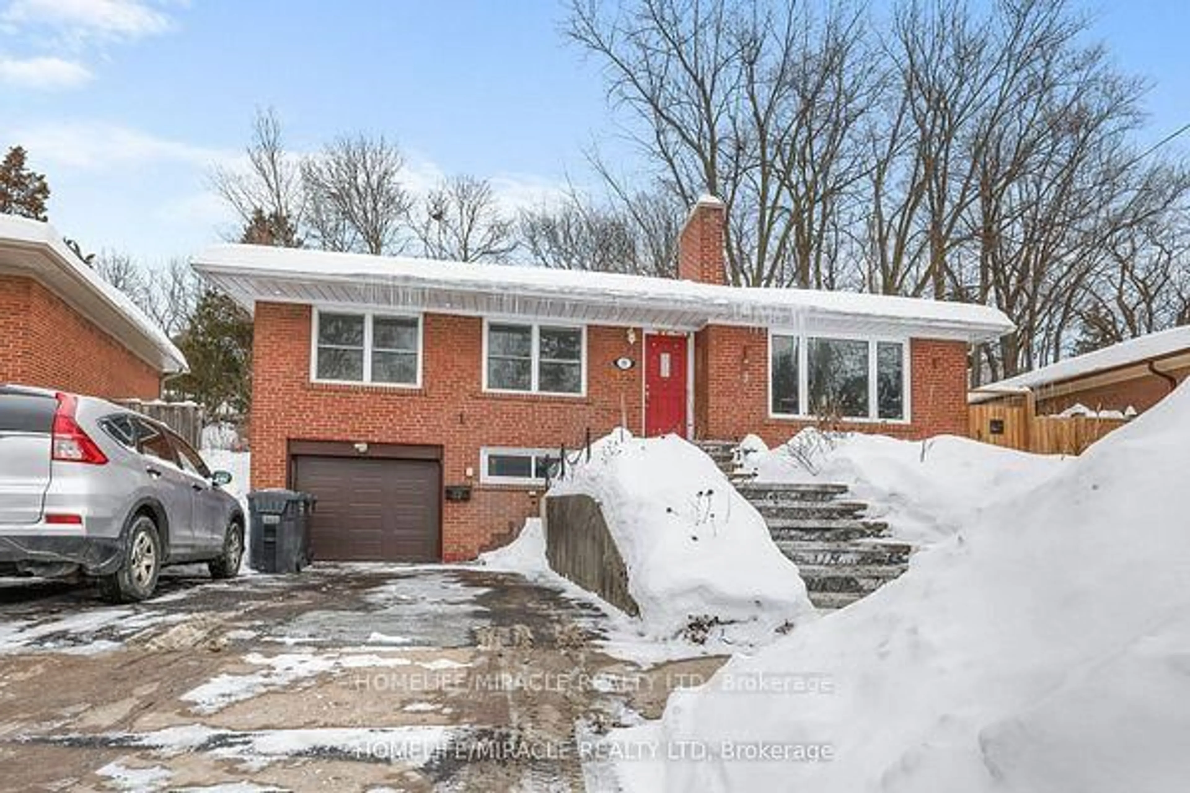 Home with brick exterior material, street for 37 Meadowland Dr, Brampton Ontario L6W 2R5