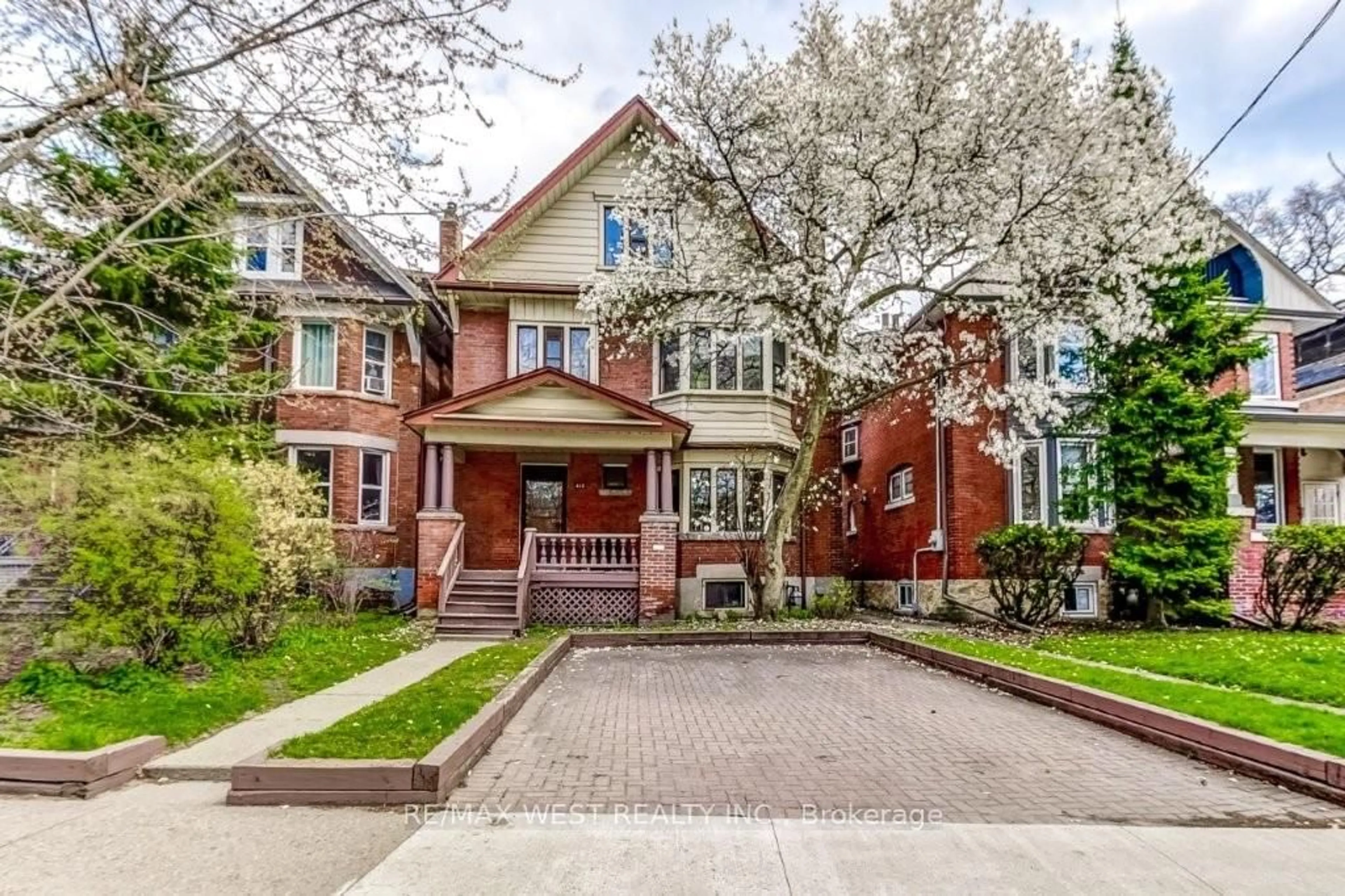 Home with brick exterior material, street for 413 Parkside Dr, Toronto Ontario M6R 2Z7