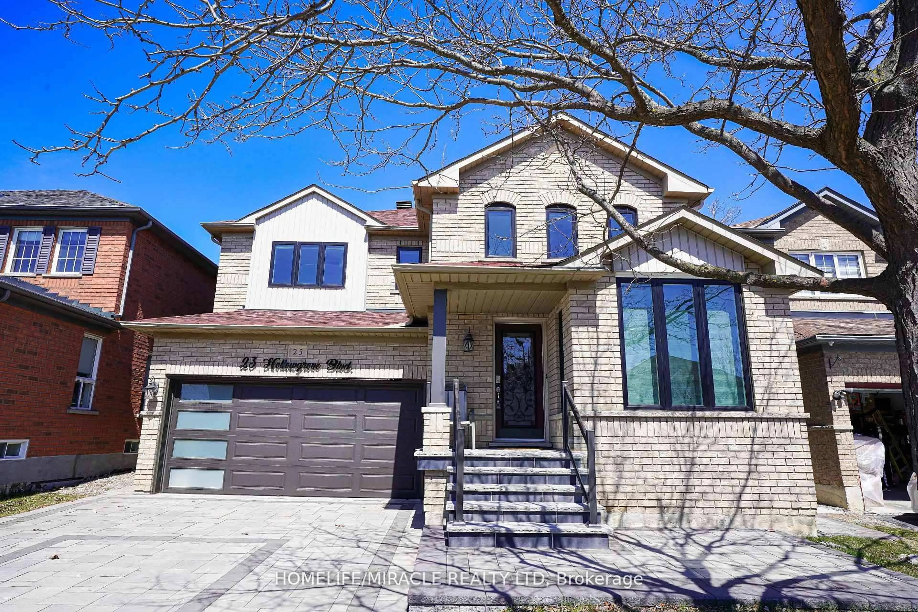 Home with brick exterior material, street for 23 Hollowgrove Blvd, Brampton Ontario L6P 1B1