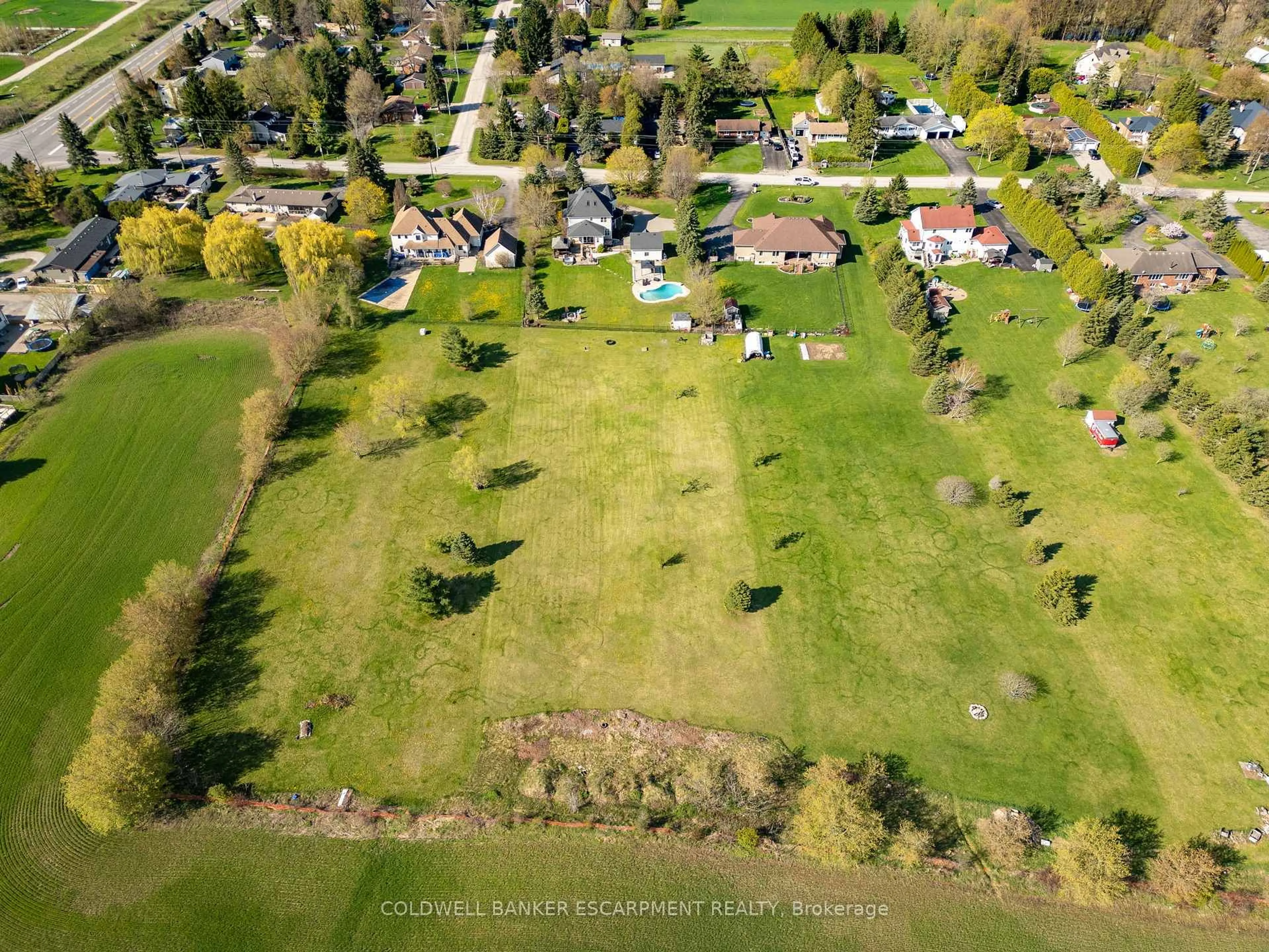 A pic from outside/outdoor area/front of a property/back of a property/a pic from drone, street for 13467 Fourth Line, Halton Hills Ontario L7J 2L8