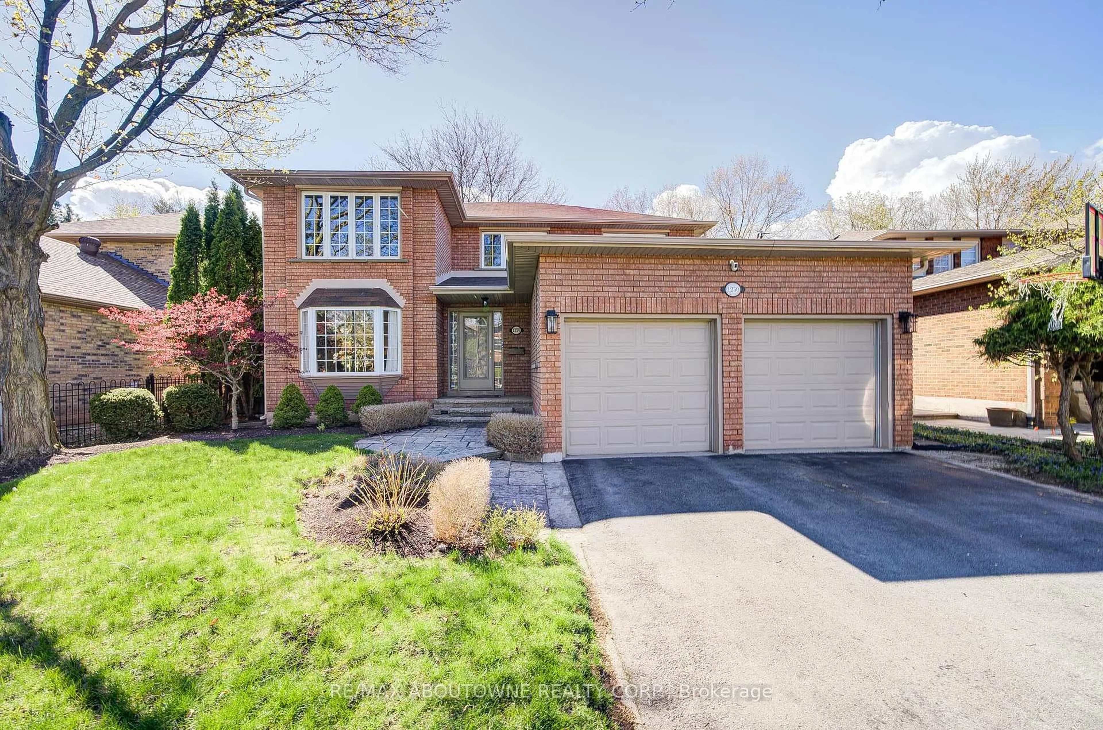Home with brick exterior material, street for 1250 Old Colony Rd, Oakville Ontario L6M 1J8