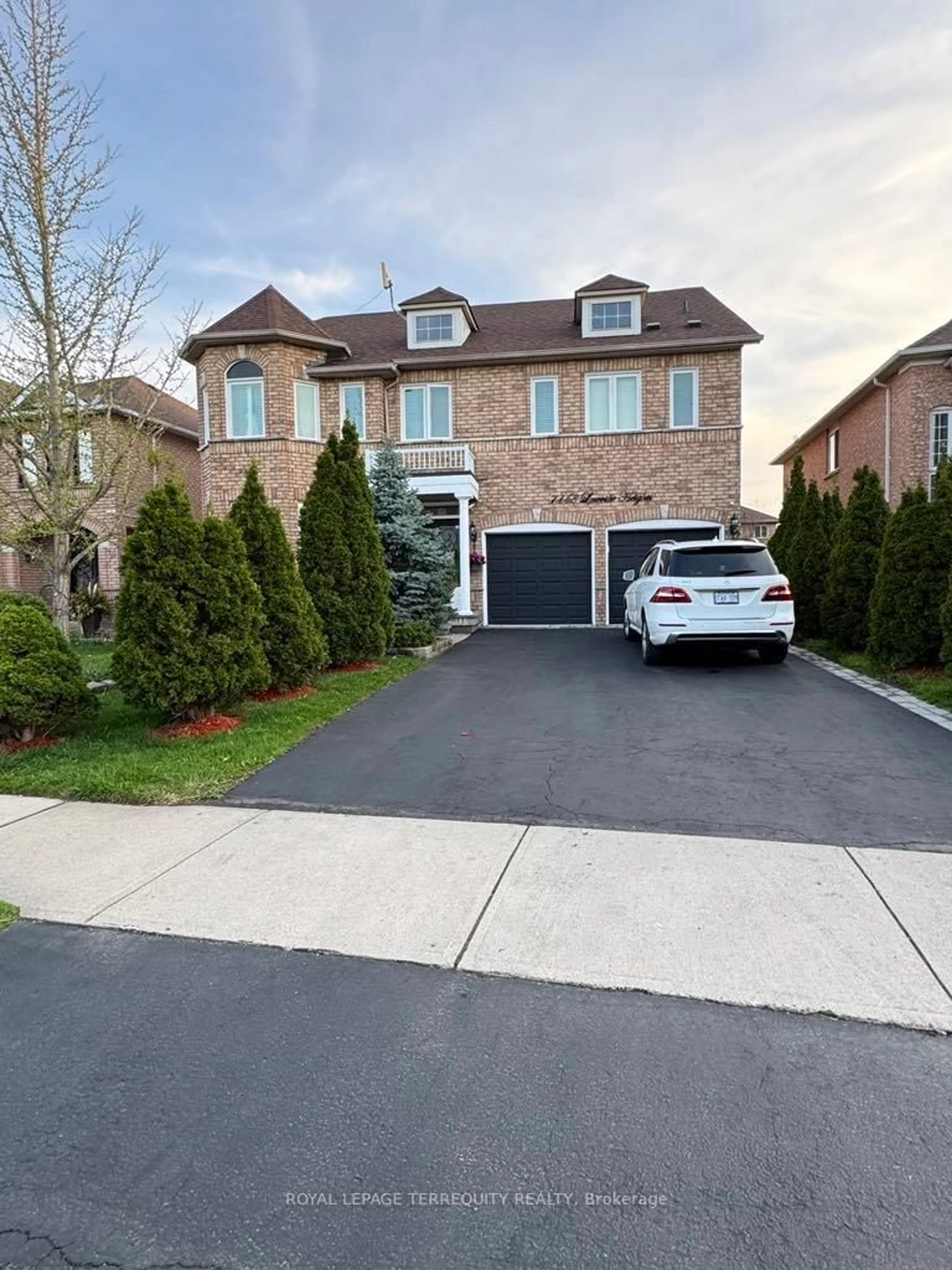 Home with brick exterior material, street for 7148 Lowville Hts, Mississauga Ontario L5N 8E6