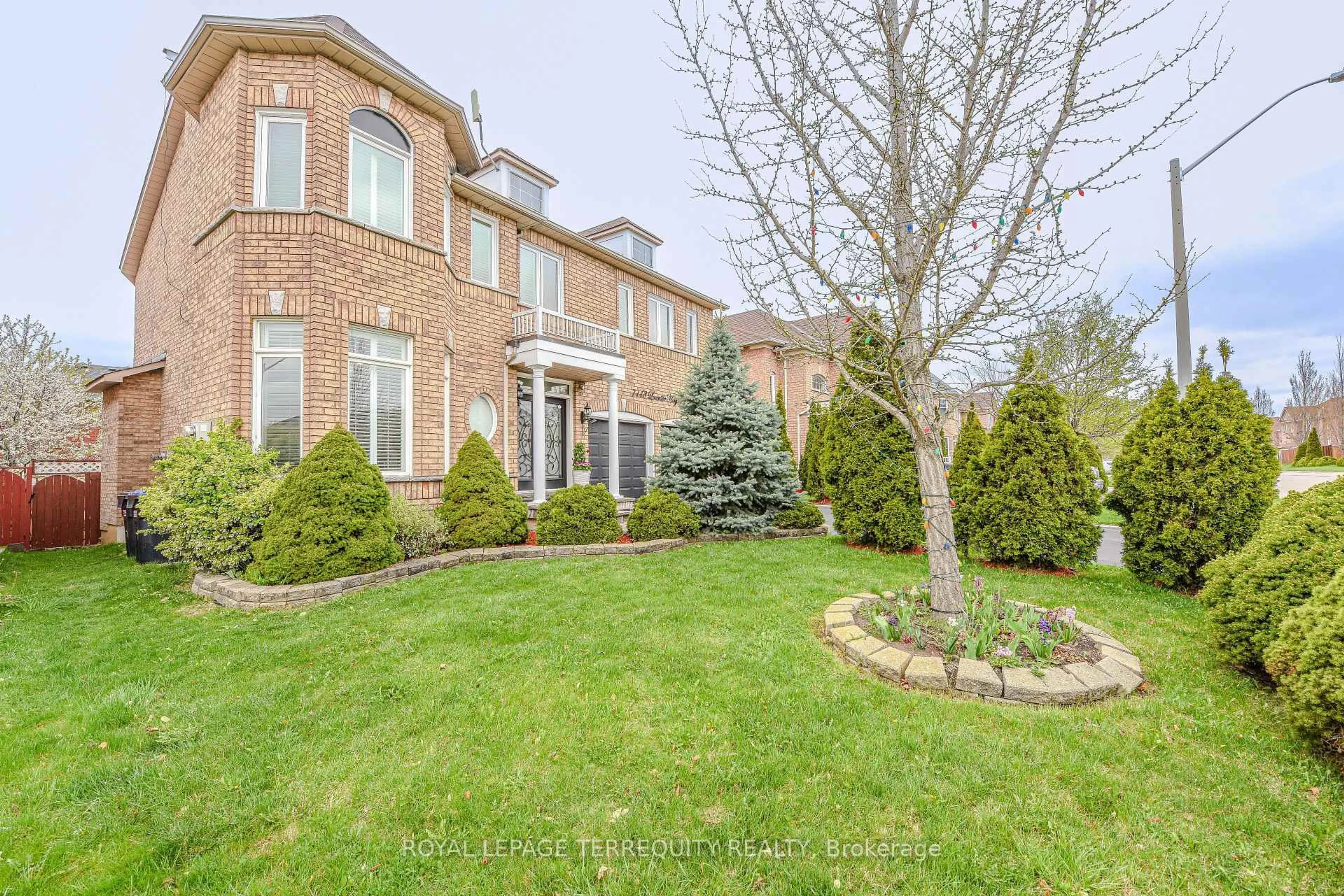 Home with brick exterior material, street for 7148 Lowville Hts, Mississauga Ontario L5N 8E6