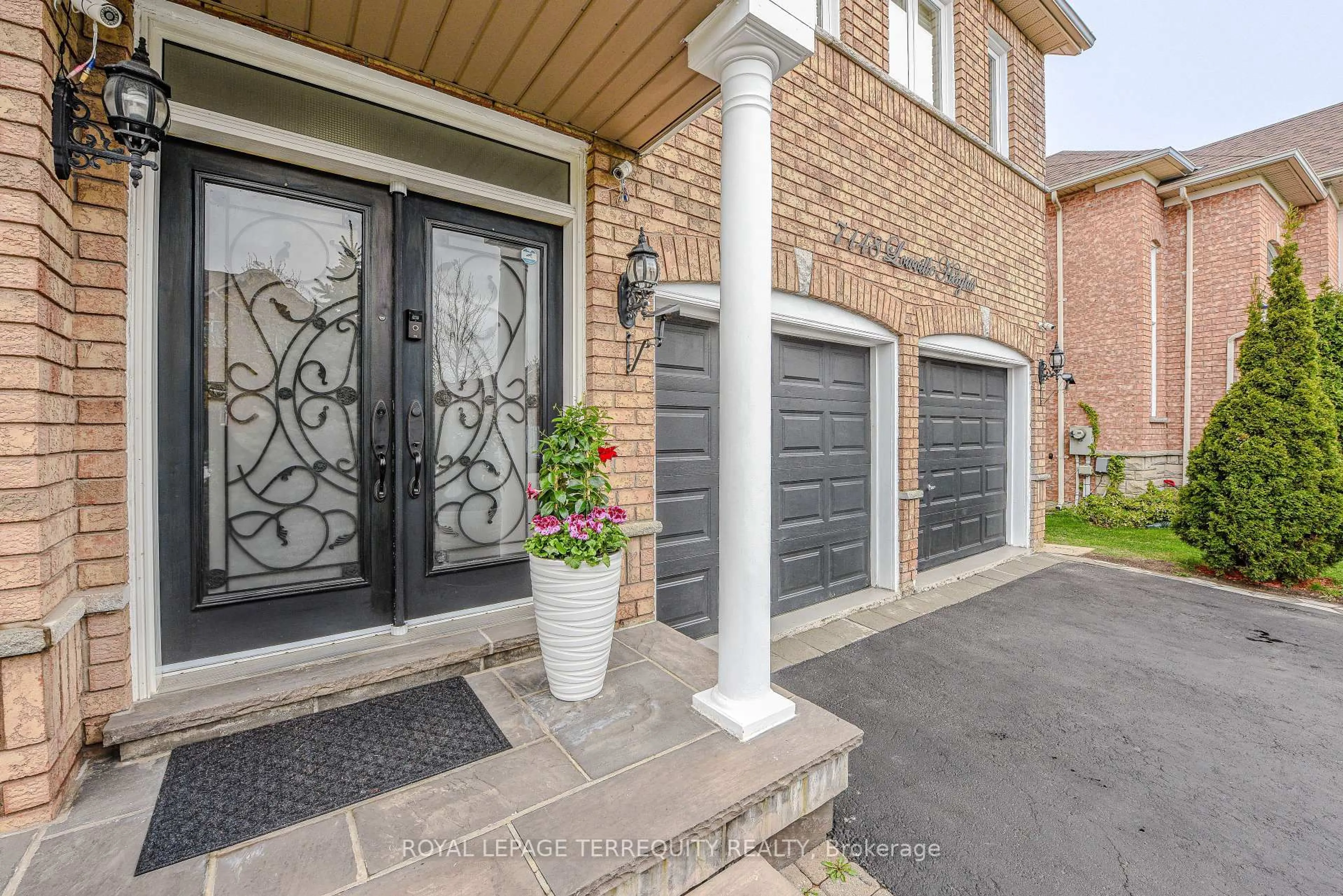 Home with brick exterior material, street for 7148 Lowville Hts, Mississauga Ontario L5N 8E6