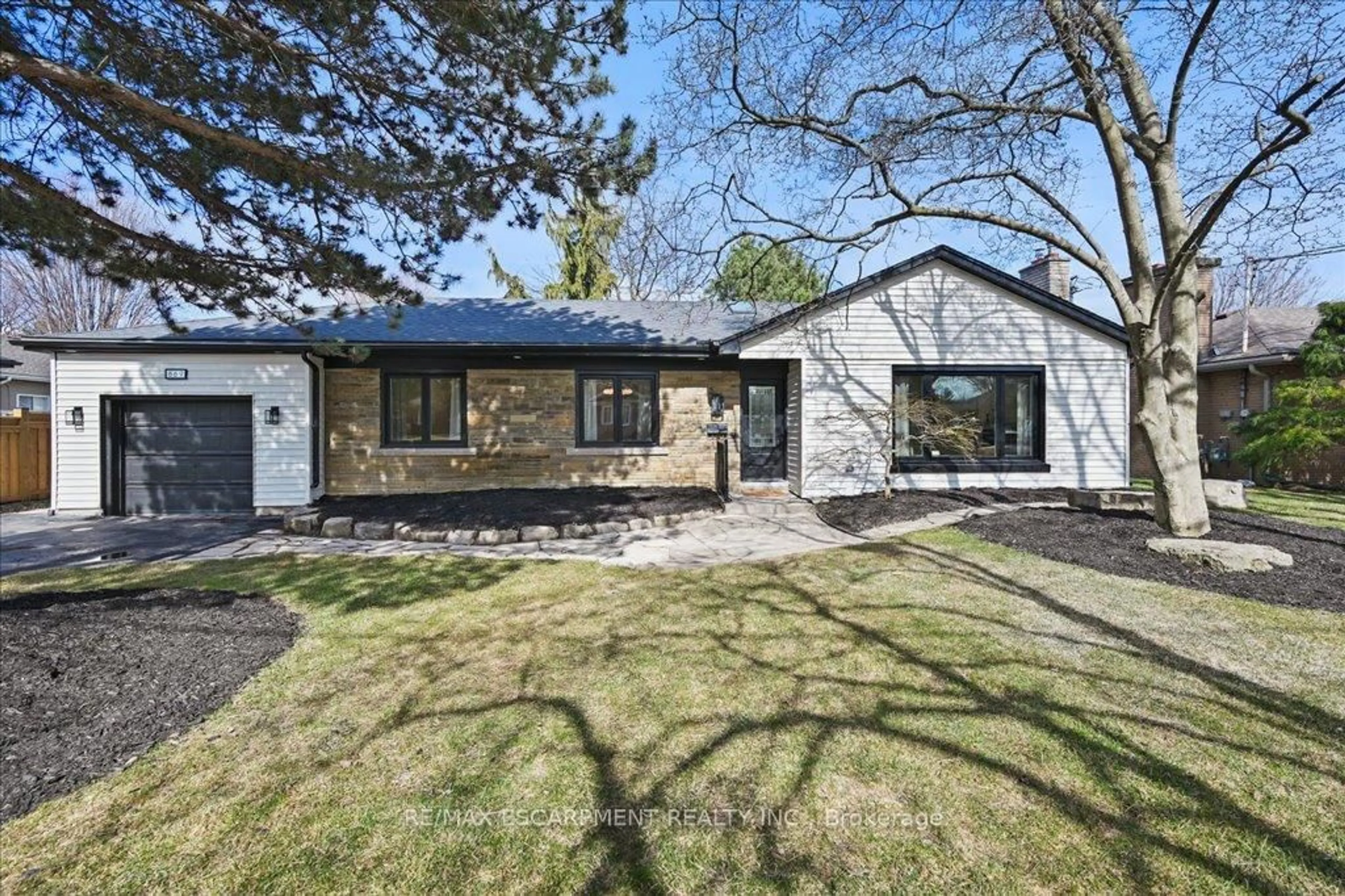 Home with brick exterior material, street for 869 CONDOR Dr, Burlington Ontario L7T 3A8