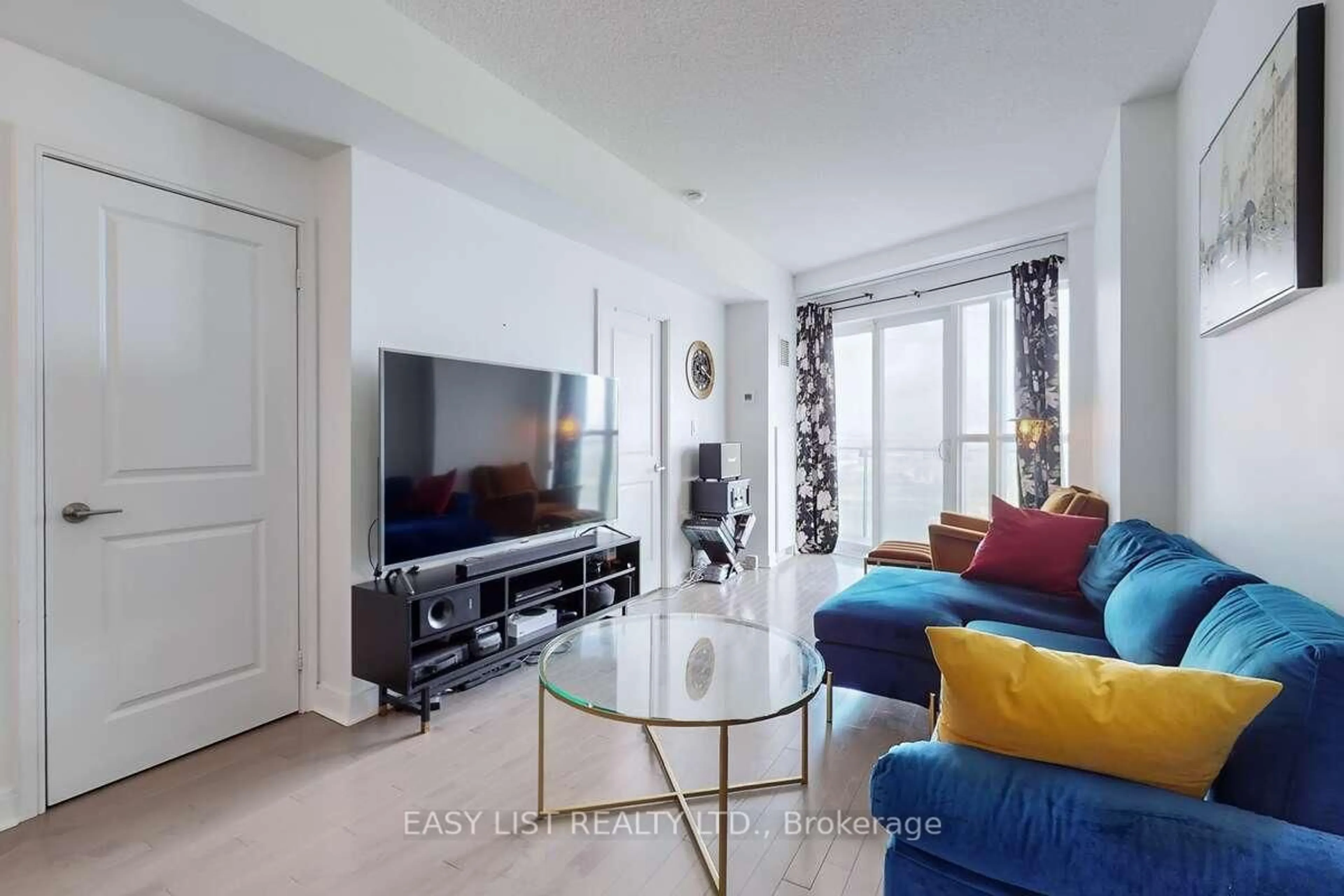 Living room with furniture, unknown for 50 Absolute Ave #3801, Mississauga Ontario L4Z 0A8