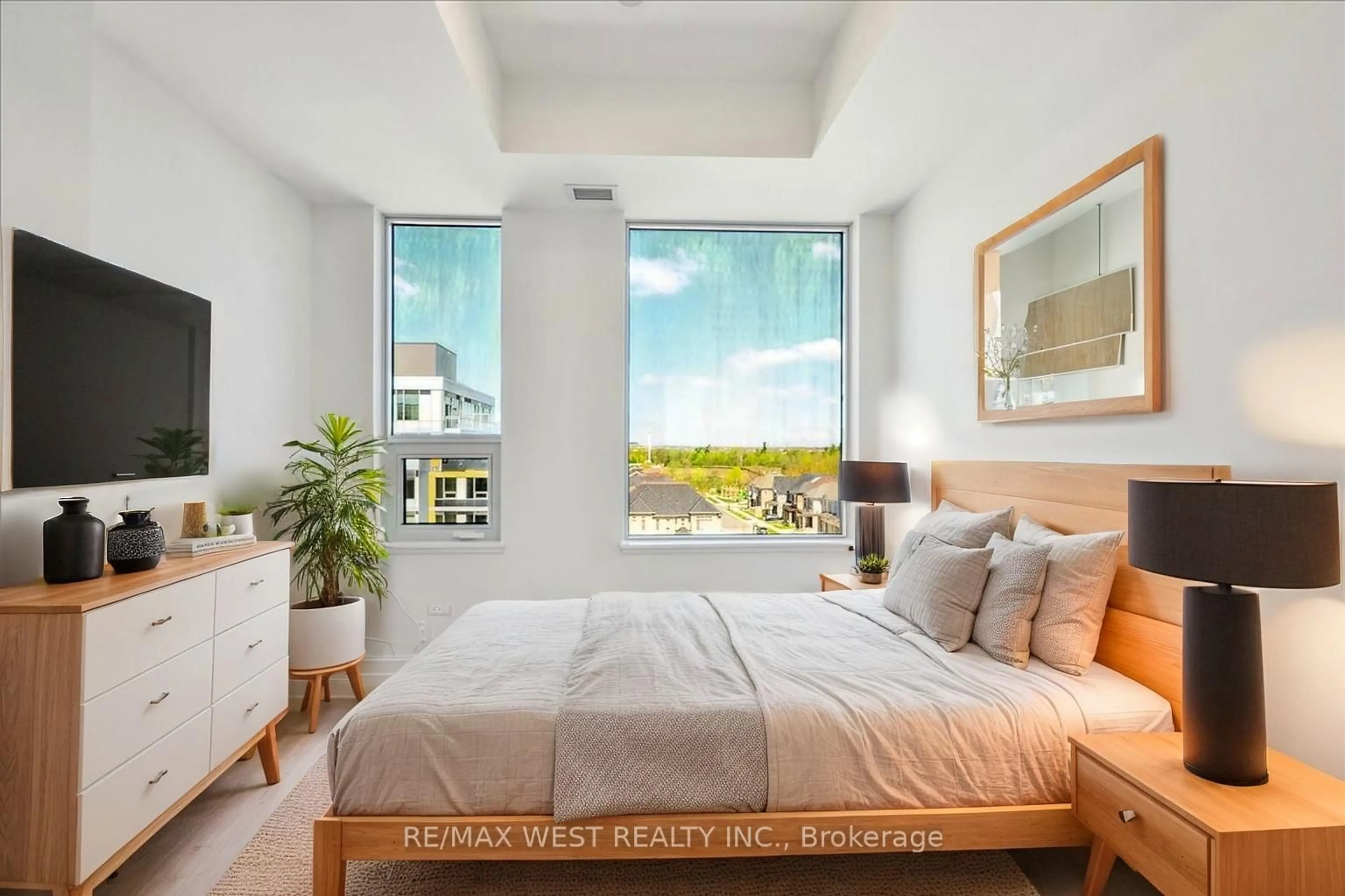 Bedroom with bed, unknown for 2501 Saw Whet Blvd #553, Oakville Ontario L6M 5N2