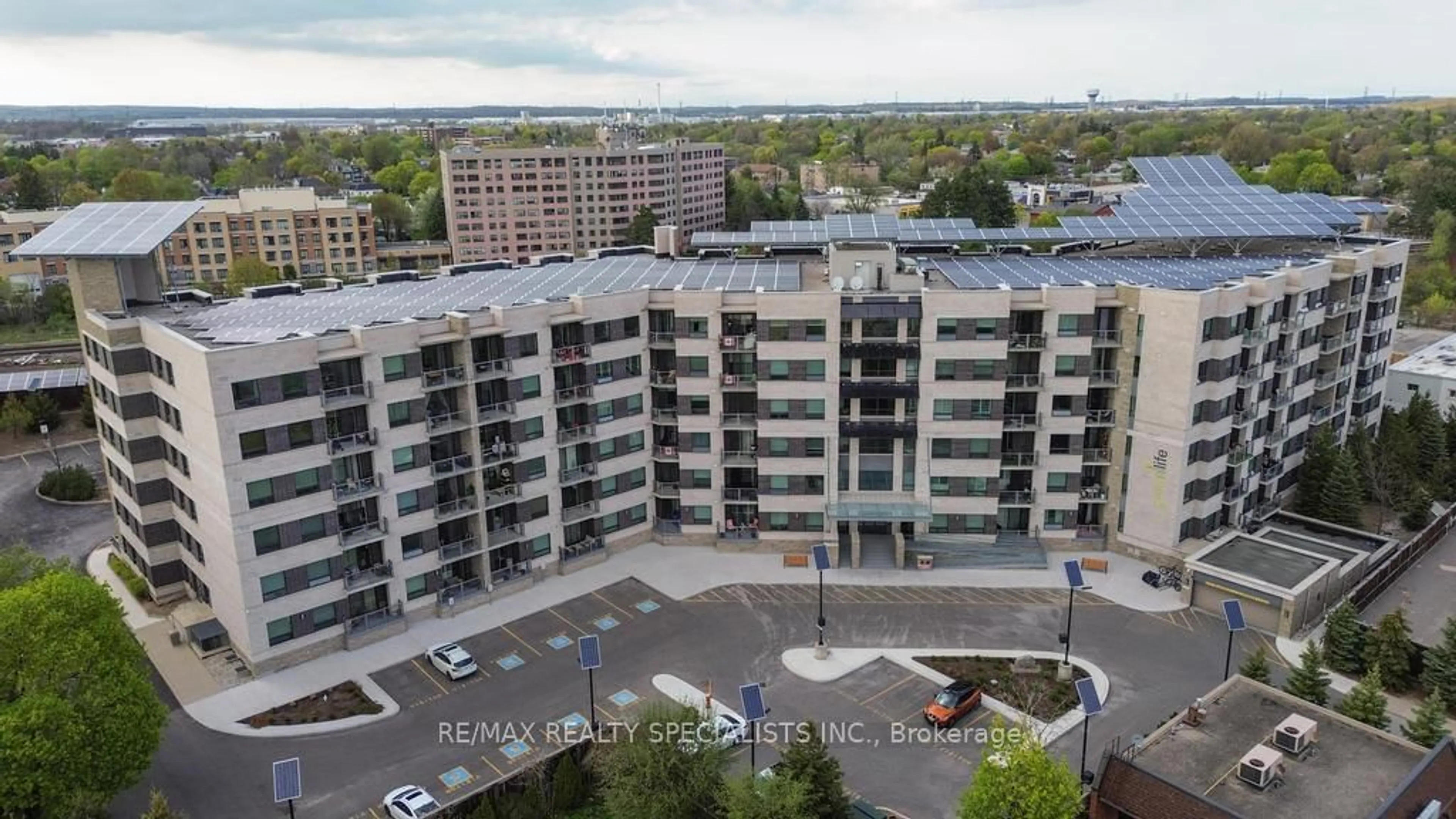 A pic from outside/outdoor area/front of a property/back of a property/a pic from drone, city buildings view from balcony for 383 Main St #103, Milton Ontario L9T 8K8