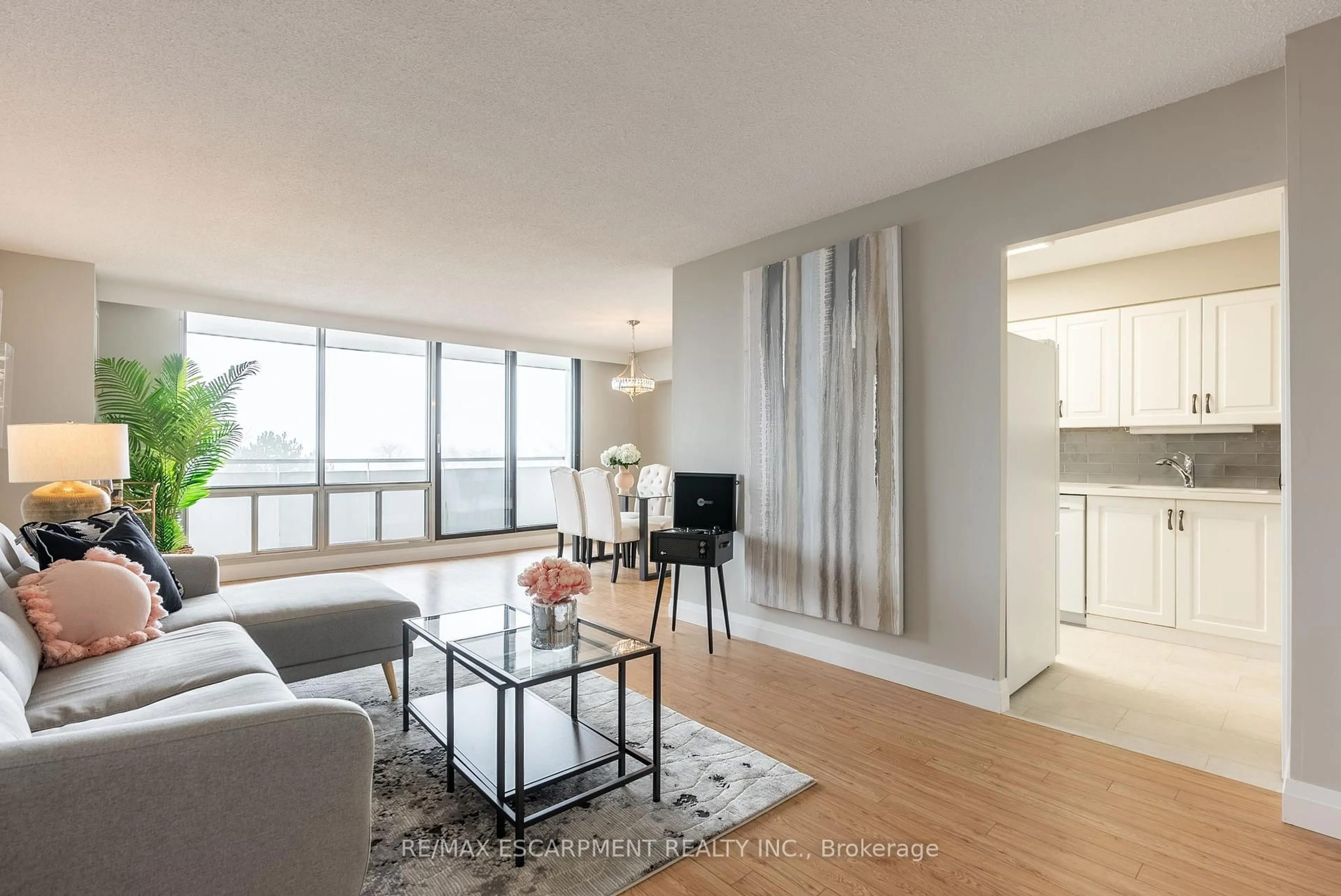 Living room with furniture, unknown for 2055 Upper Middle Rd #306, Burlington Ontario L7P 3P4