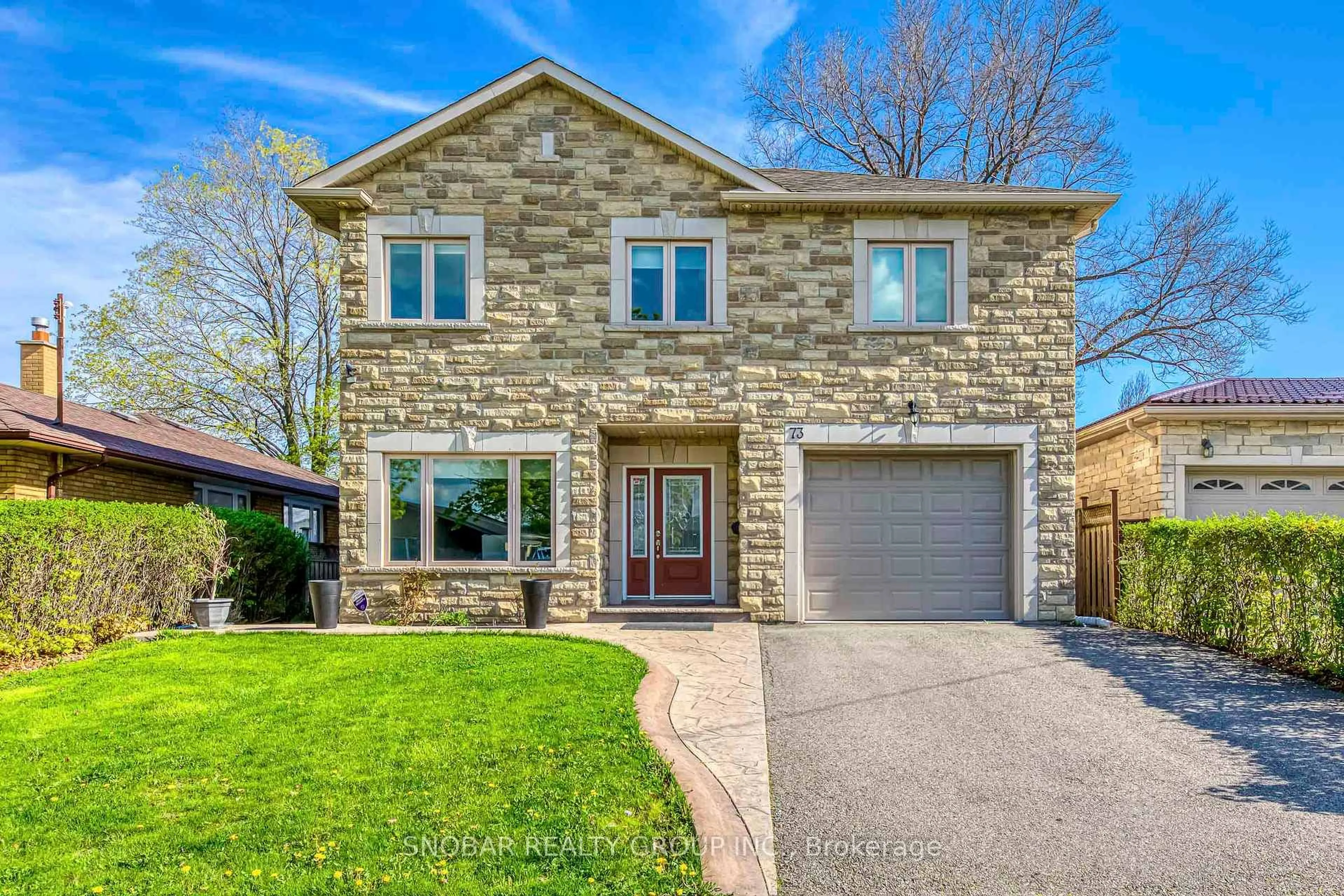 Home with brick exterior material, street for 73 Westhampton Dr, Toronto Ontario M9R 1Y1