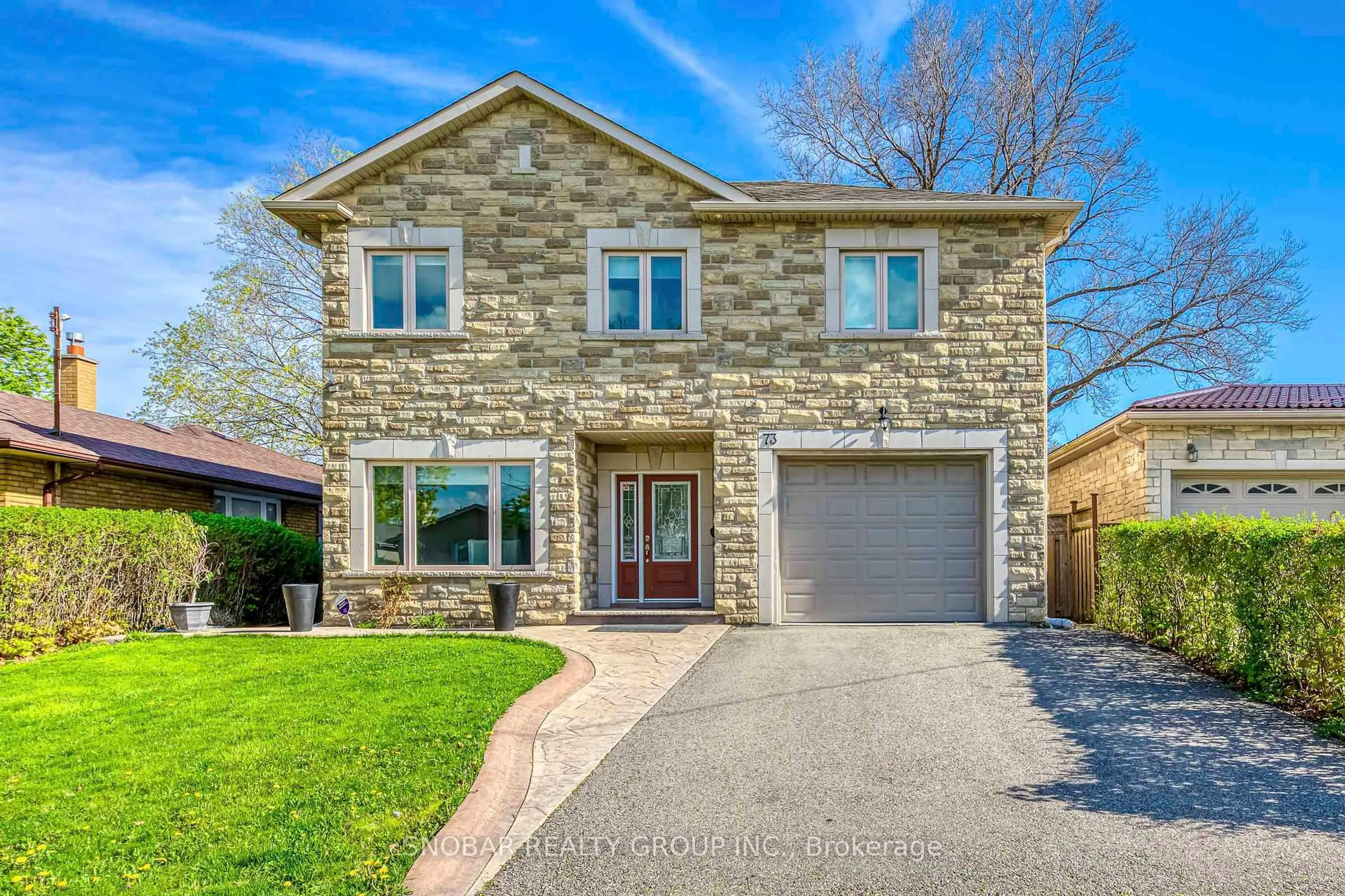 Home with brick exterior material, street for 73 Westhampton Dr, Toronto Ontario M9R 1Y1