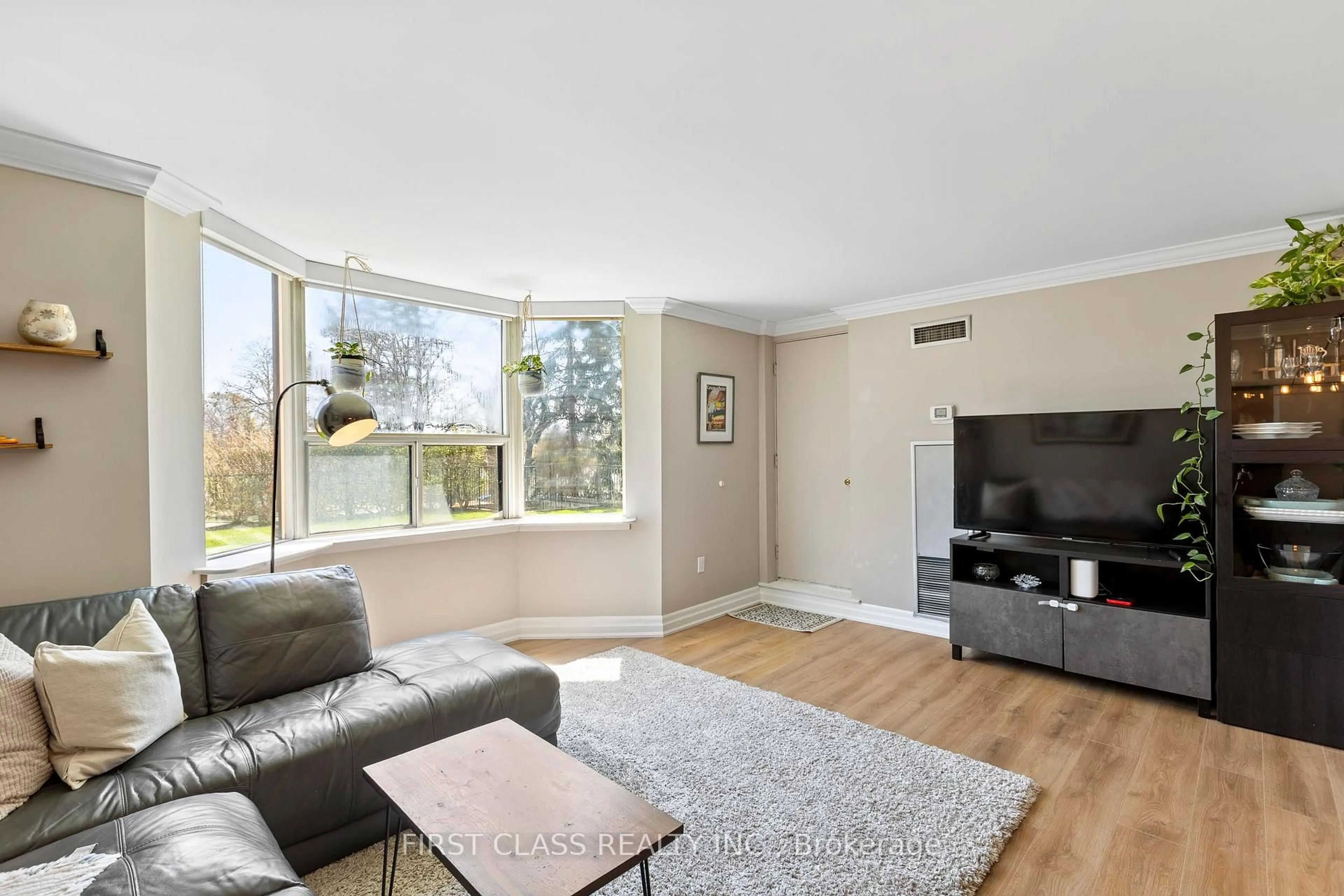 Living room with furniture, unknown for 3845 Lake Shore Blvd #102, Toronto Ontario M8W 4Y3