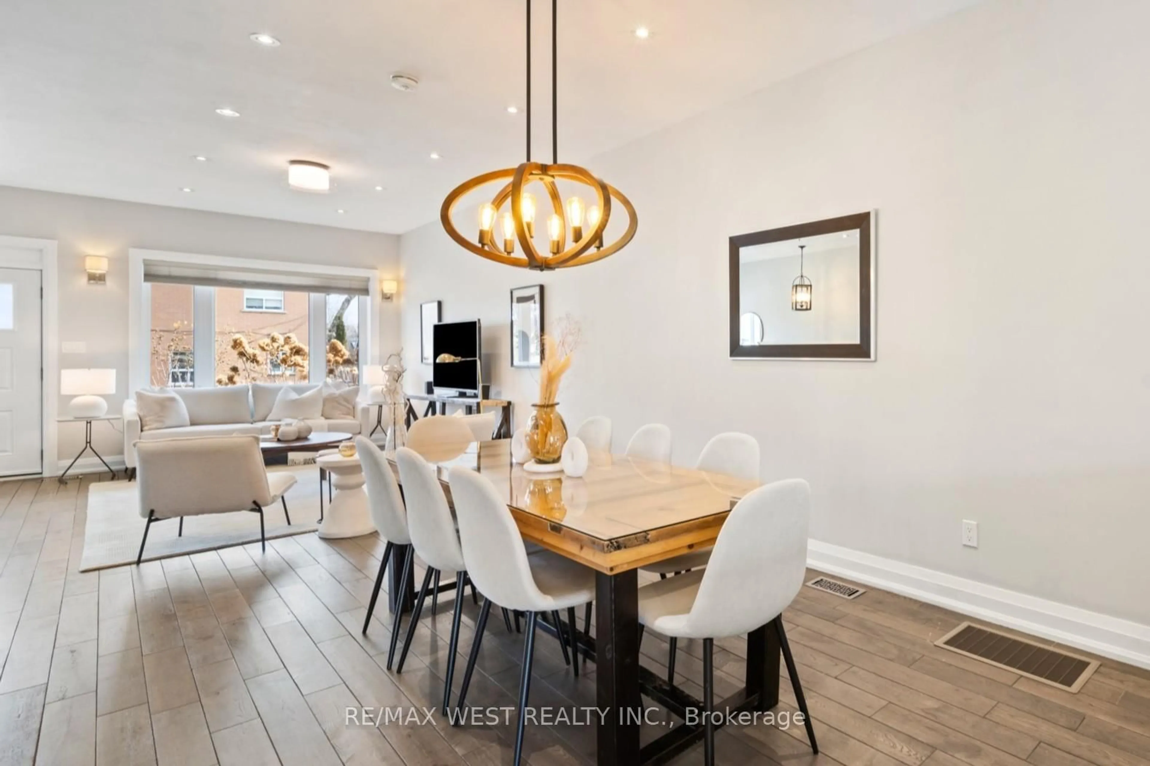 Dining room, wood/laminate floor for 714 Willard Ave, Toronto Ontario M6S 3S5