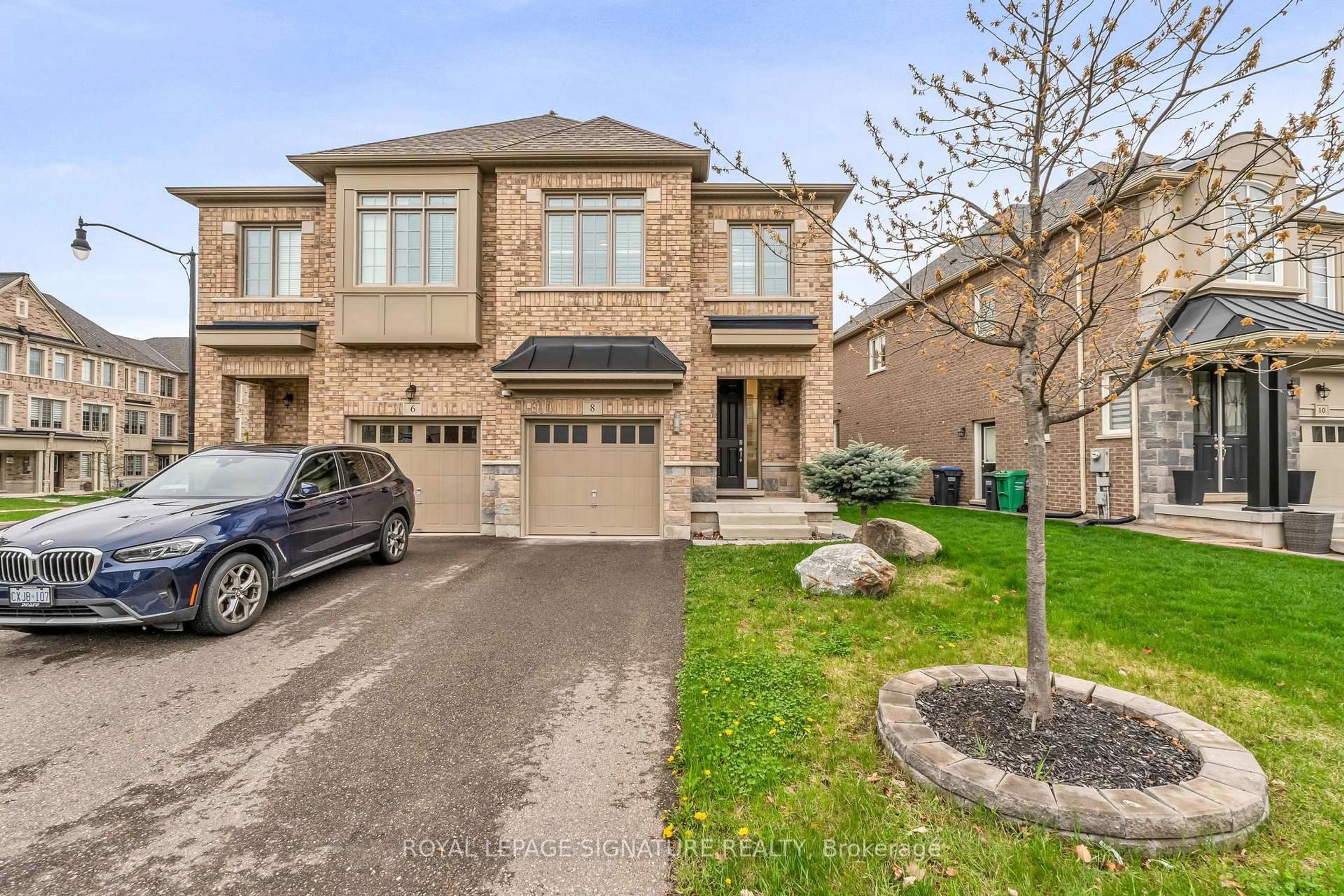 Home with brick exterior material, street for 8 Gruenwald Gate, Brampton Ontario L6Y 0E3